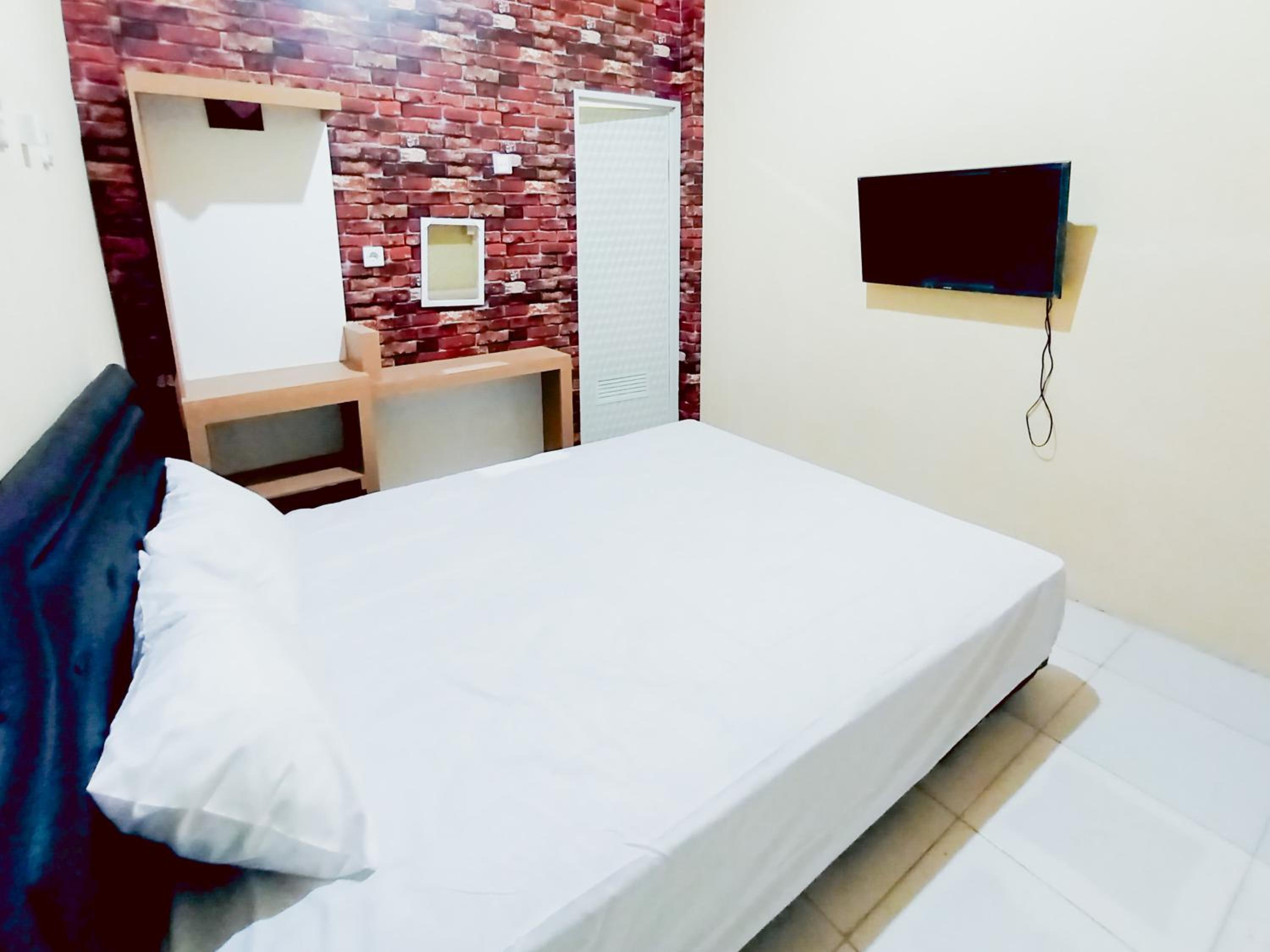 Deluxe Room - Photo 6