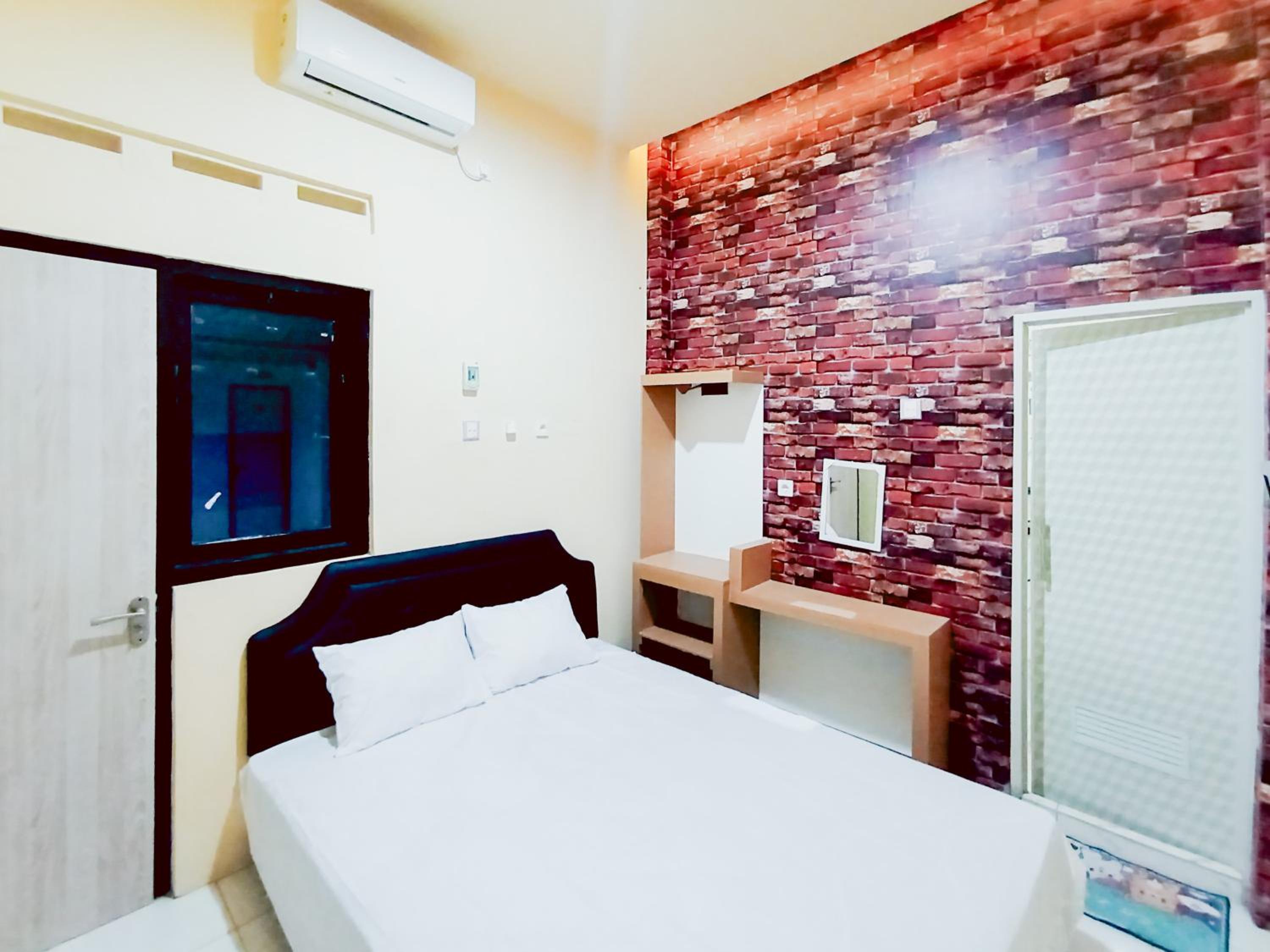 Deluxe Room - Photo 2