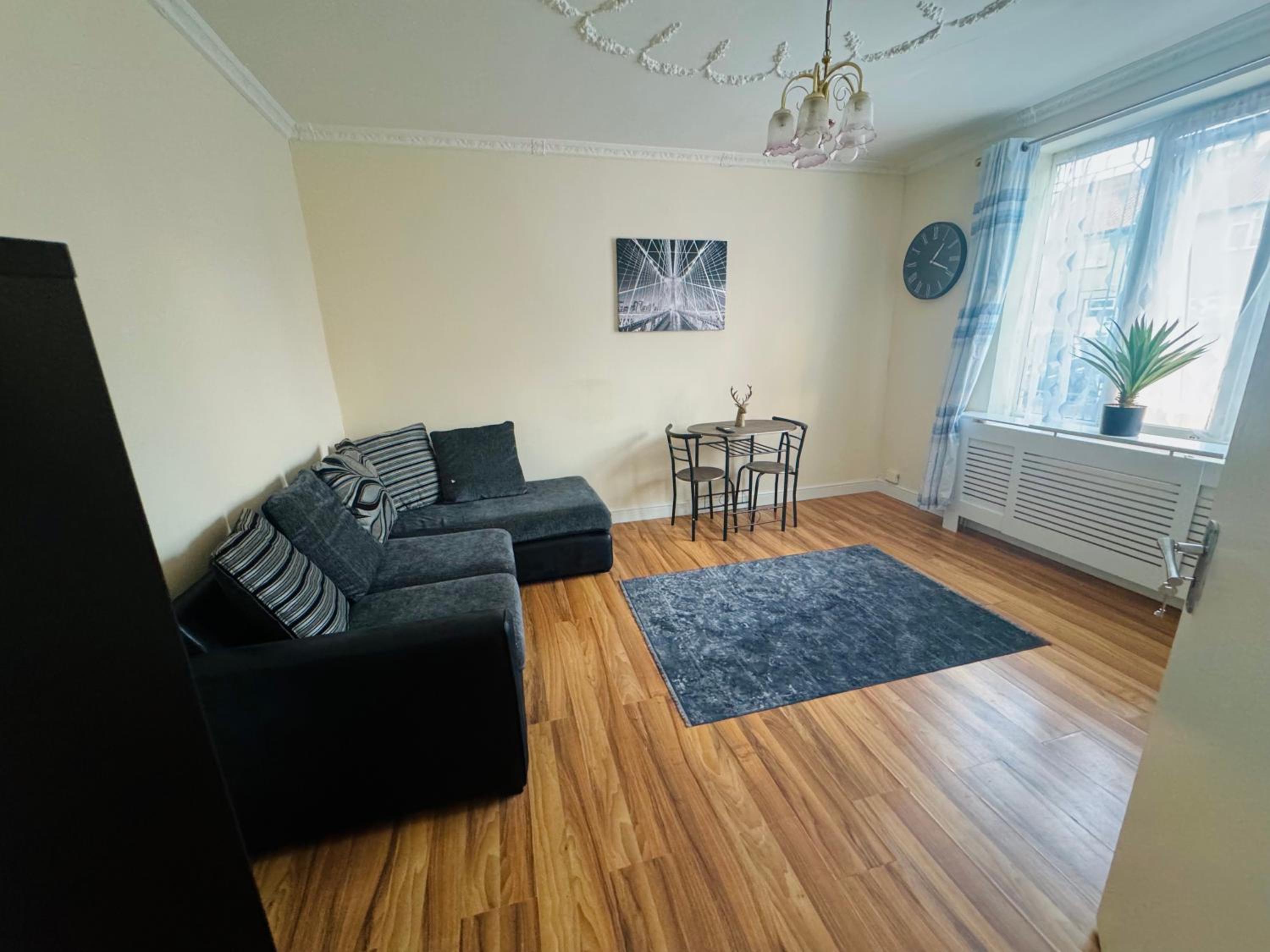 Three-Bedroom Apartment photo 1