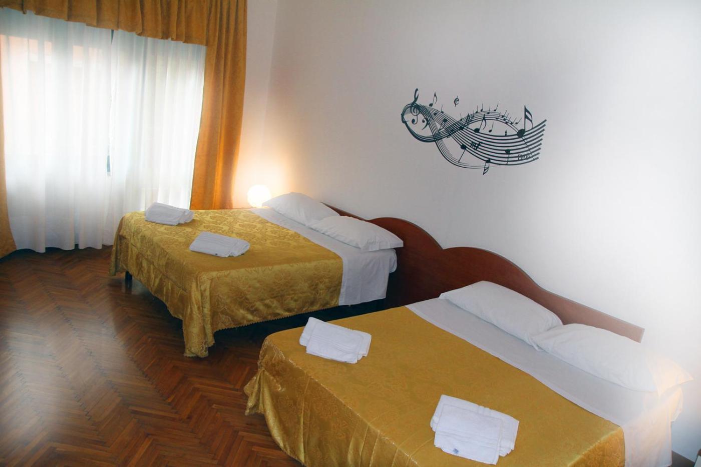Quadruple Room with Shared Bathroom