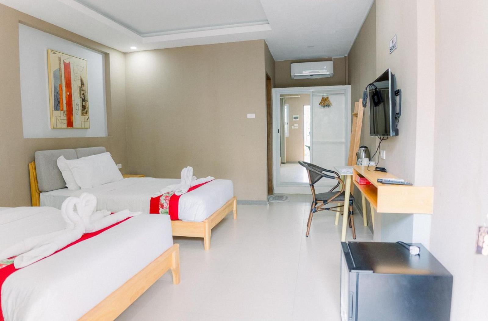 Standard Quadruple Room - Photo 8
