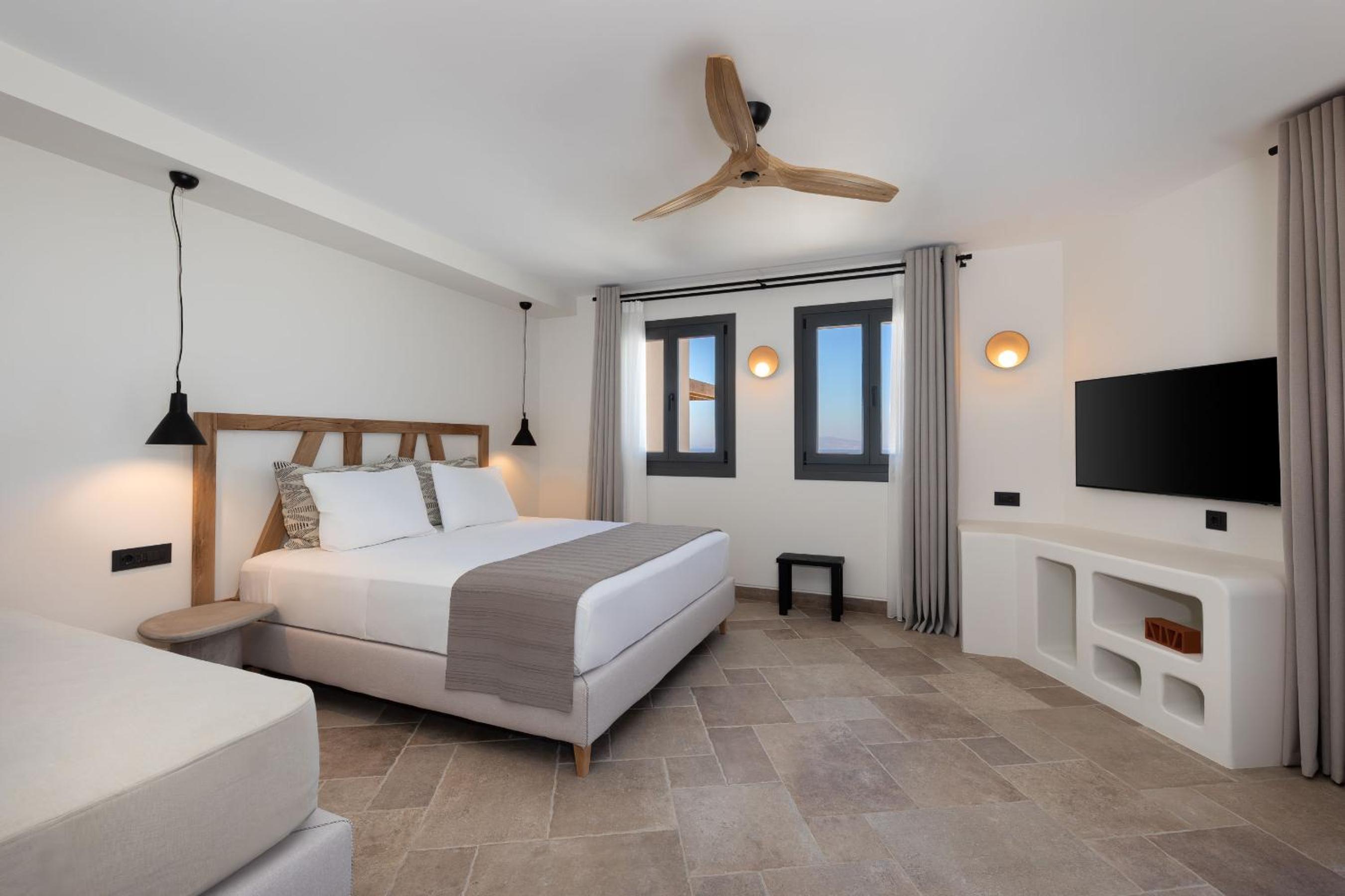 Executive room with outdoor private heated jetted tub and sea view