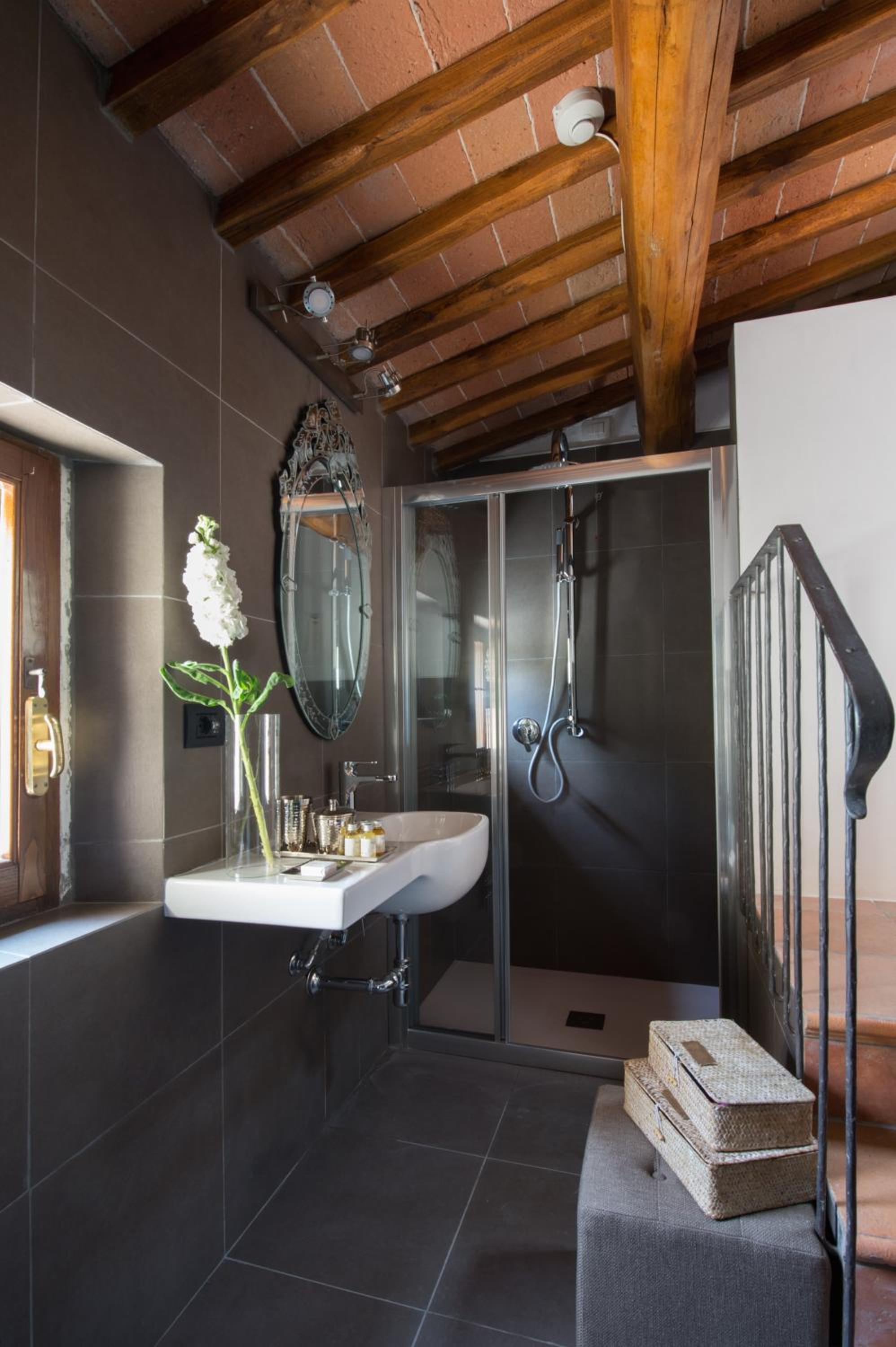 bathroom with a shower, sink, and bathtub
