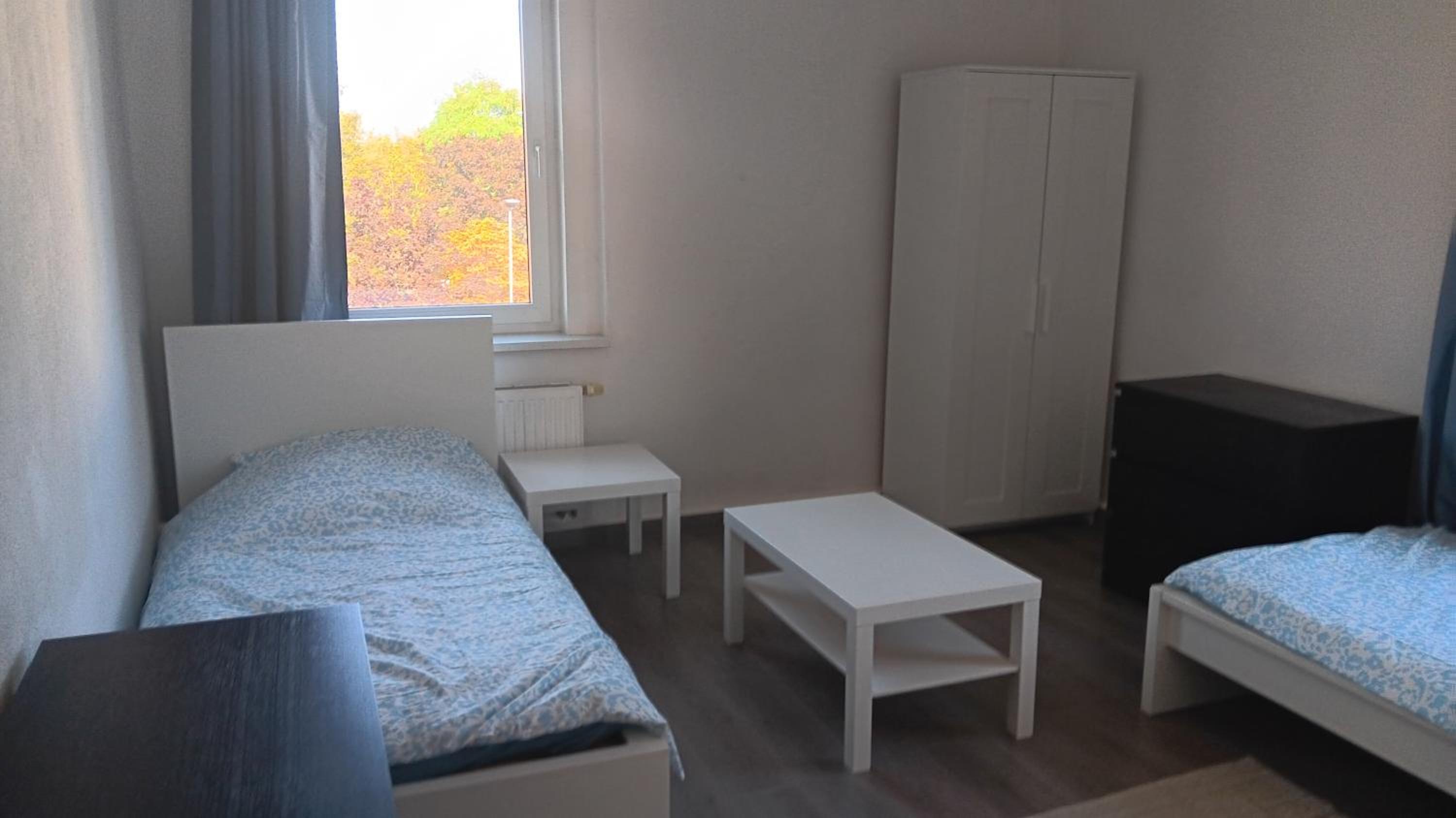 Three-Bedroom Apartment photo 1
