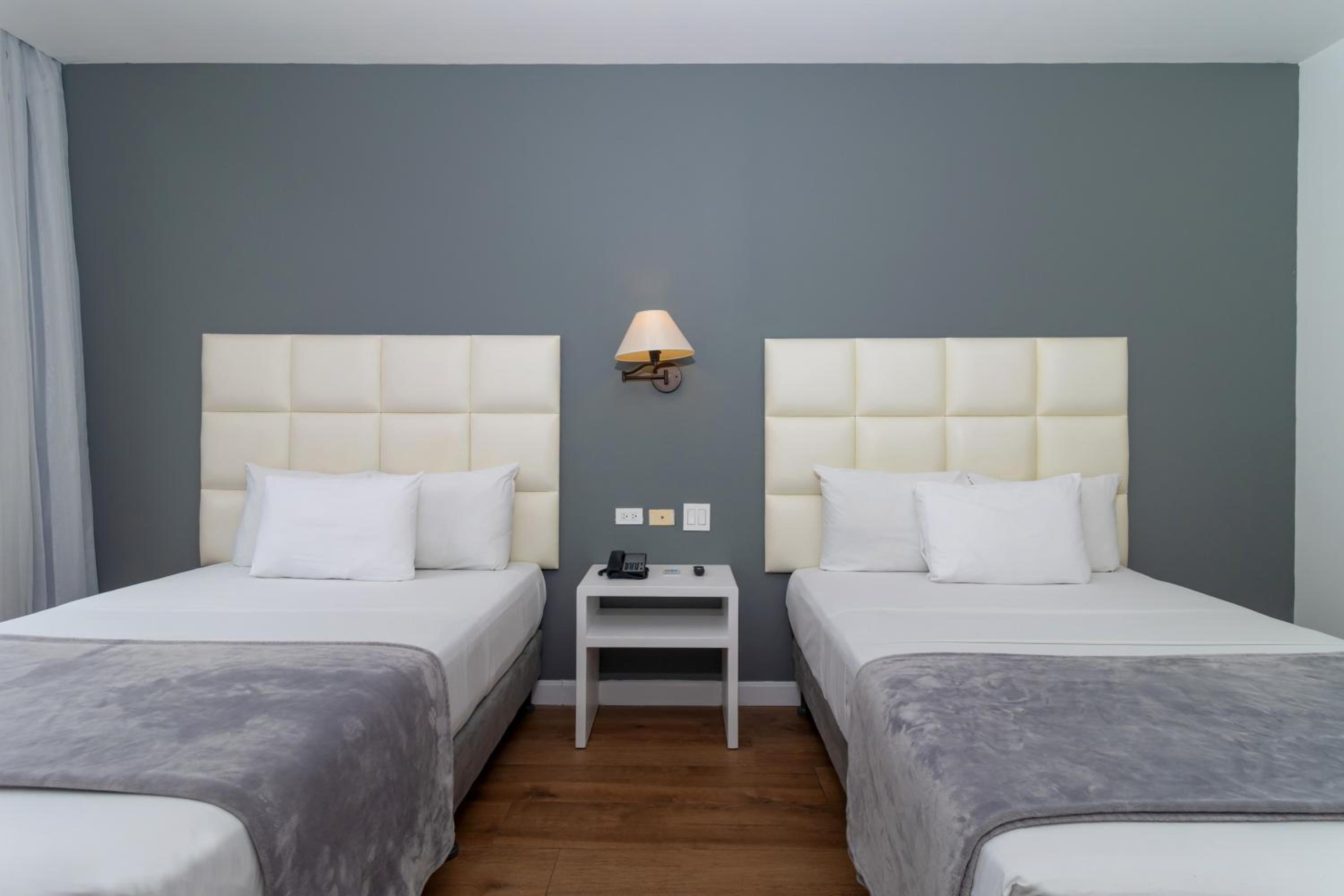 Deluxe Double Room – 2 Beds - Photo 11
