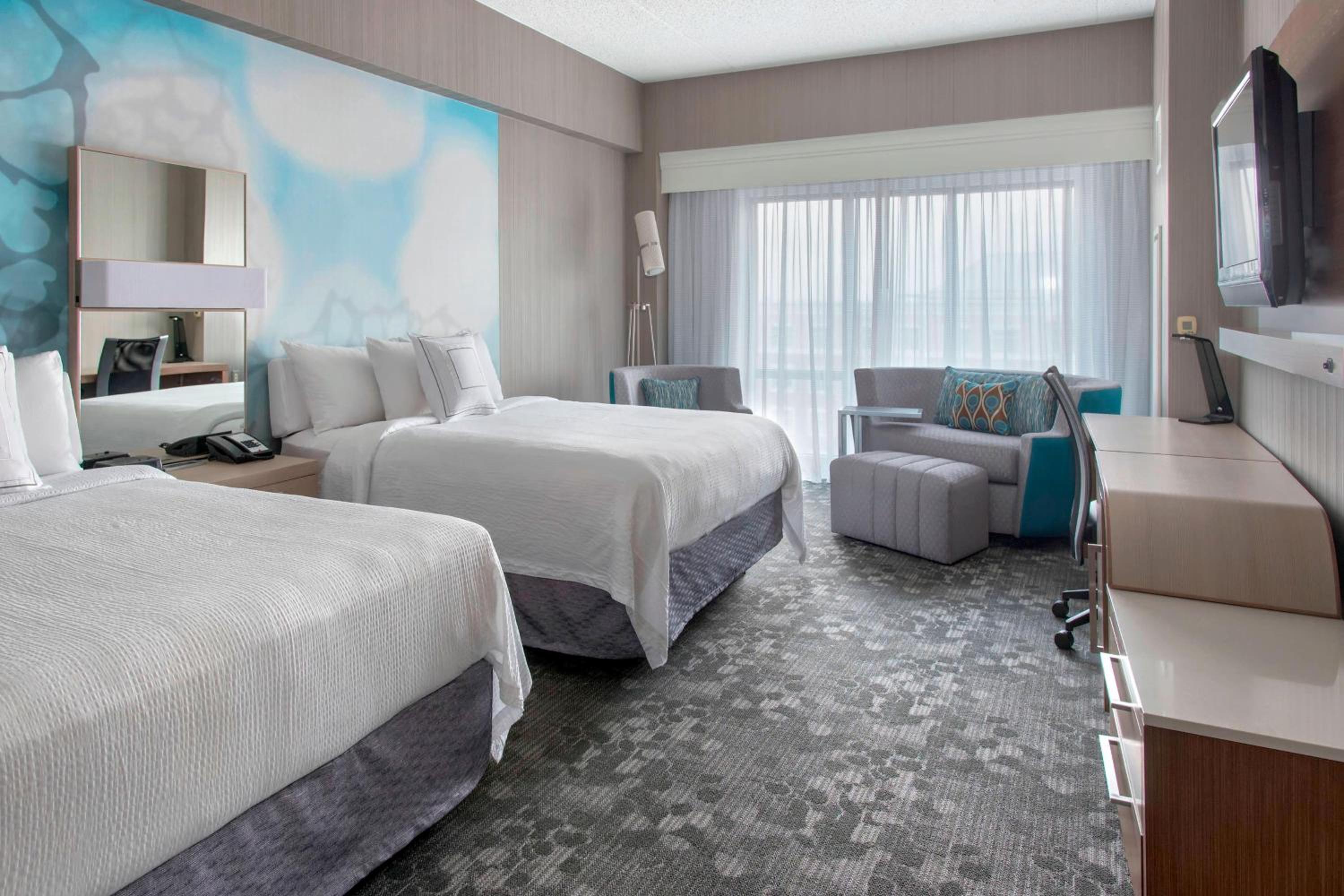 Large Queen Room with Two Queen Beds and Sofa Bed - Hearing Accessible - Photo 1