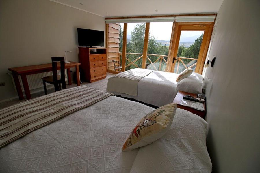 Deluxe Queen Room with Two Queen Beds photo 1