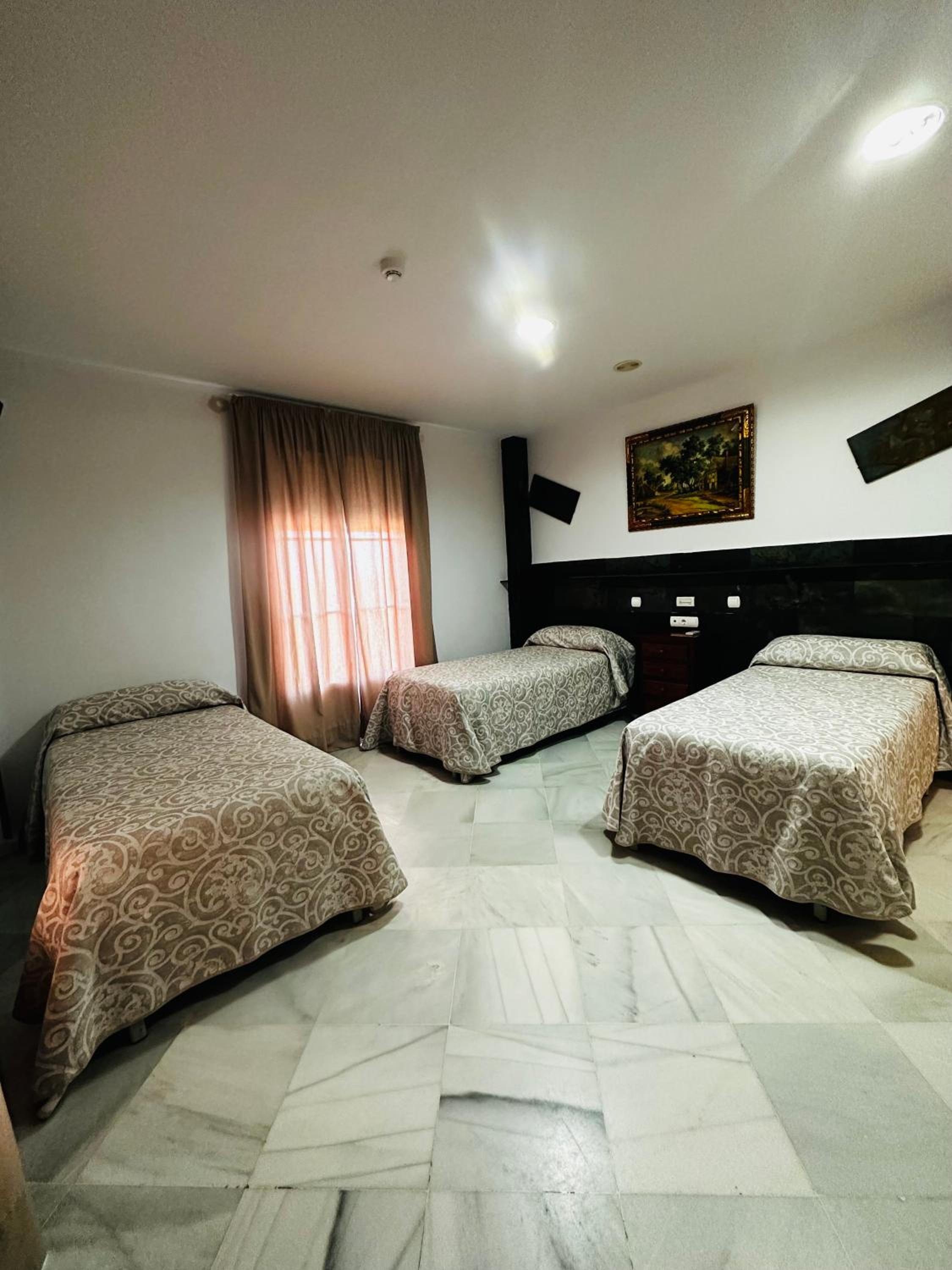 Triple Room - Photo 1
