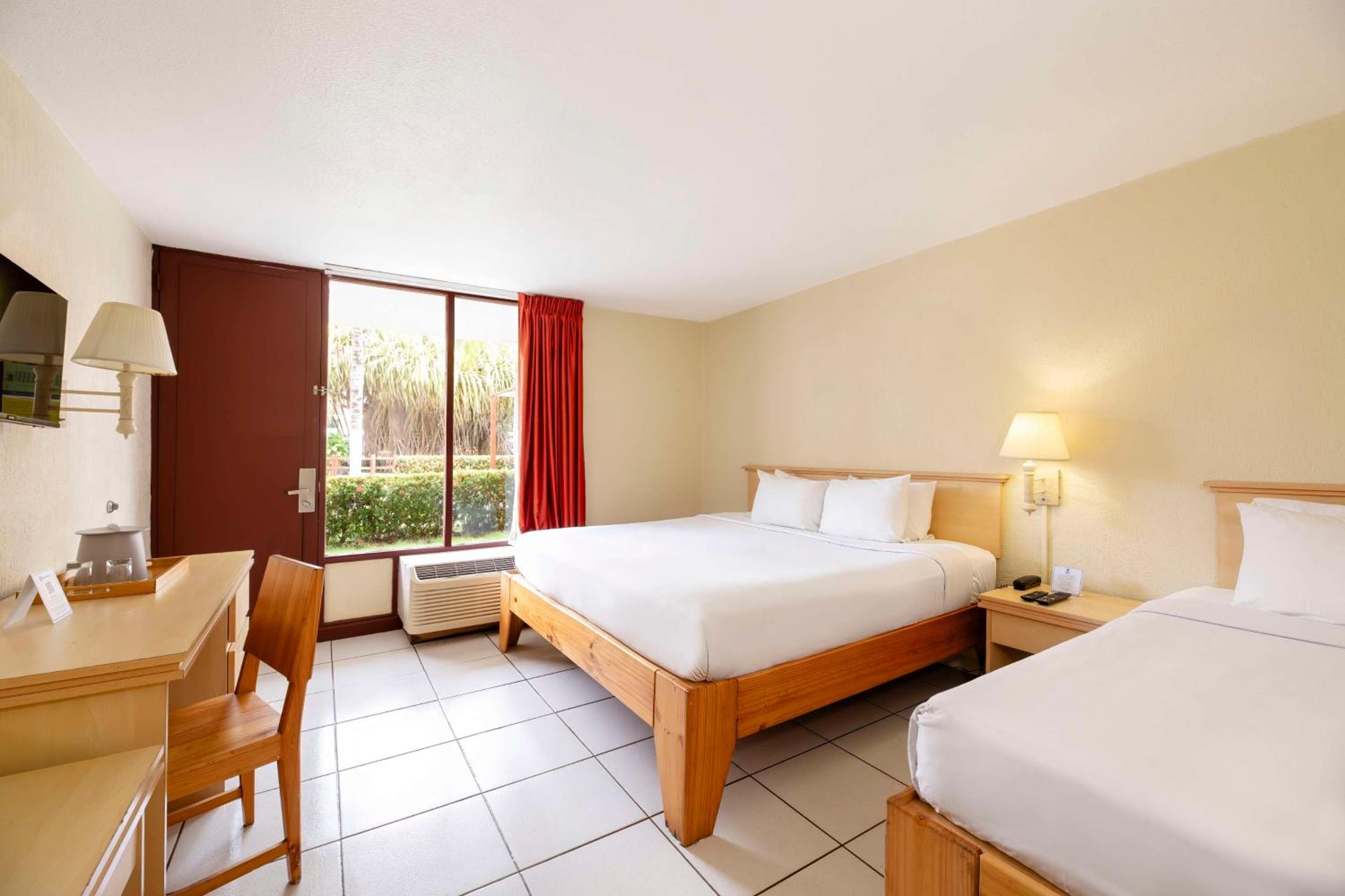 Room with One Double and One Single Bed and Garden View - Non-Smoking