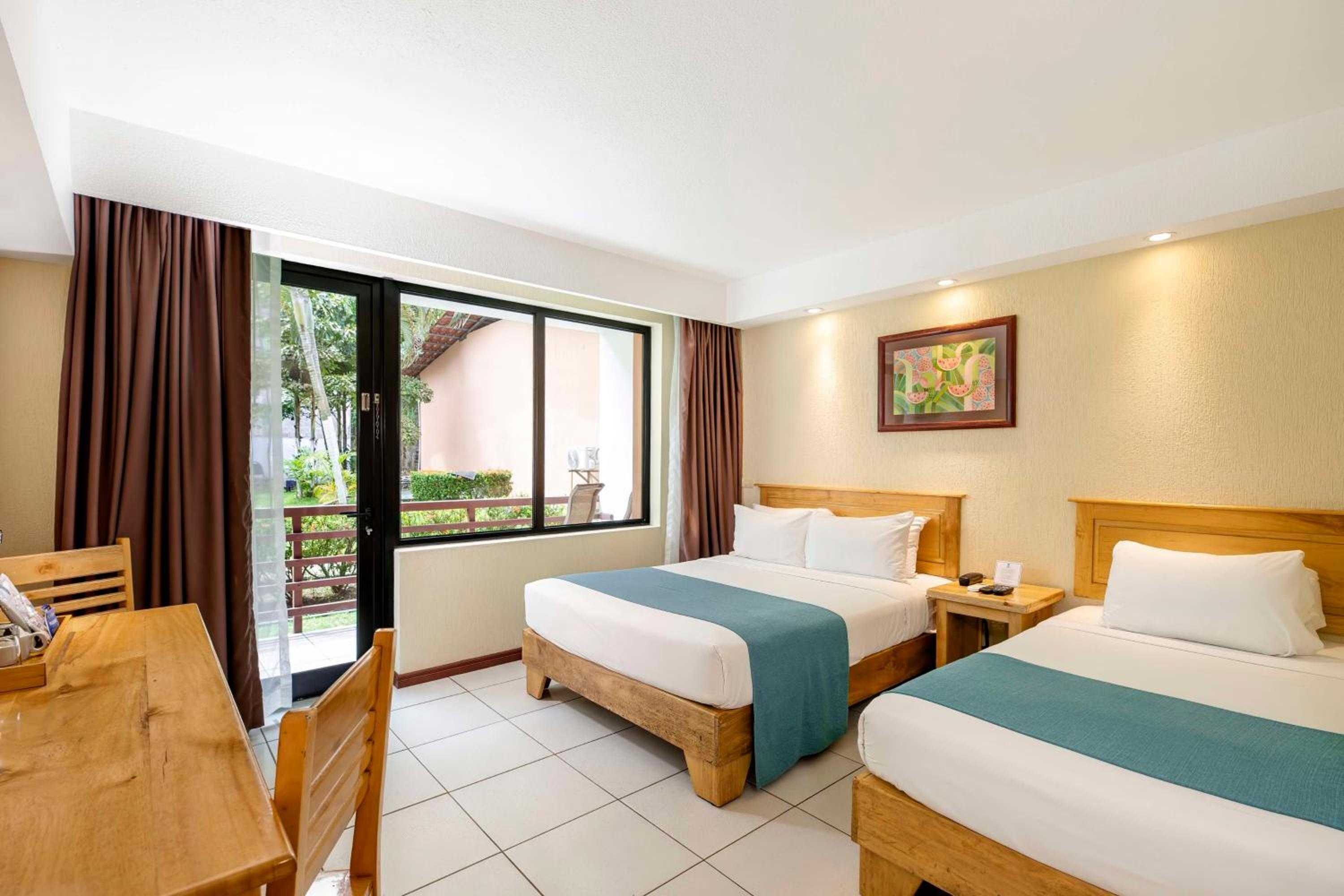 Double Room with Two Double Beds and Balcony - Non-Smoking