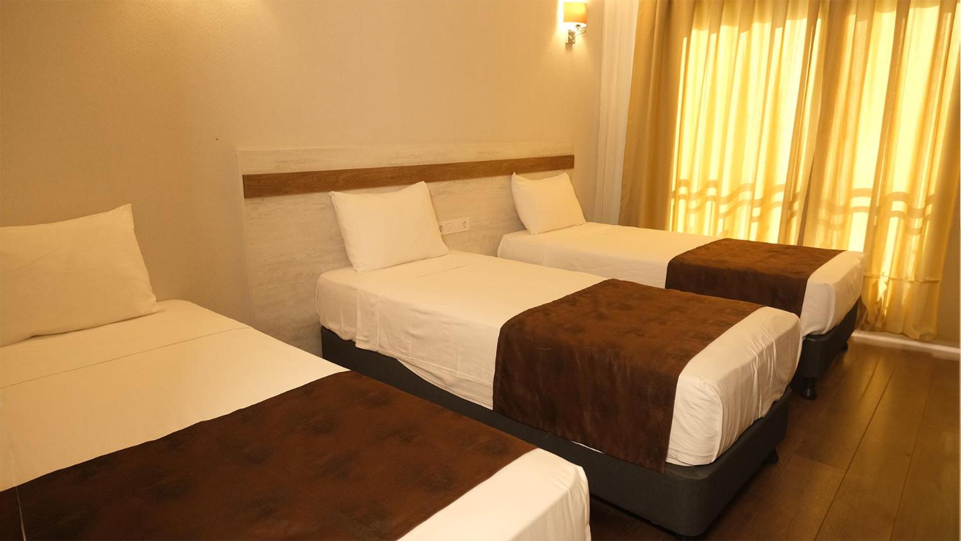 Standard Triple Room - Photo 9