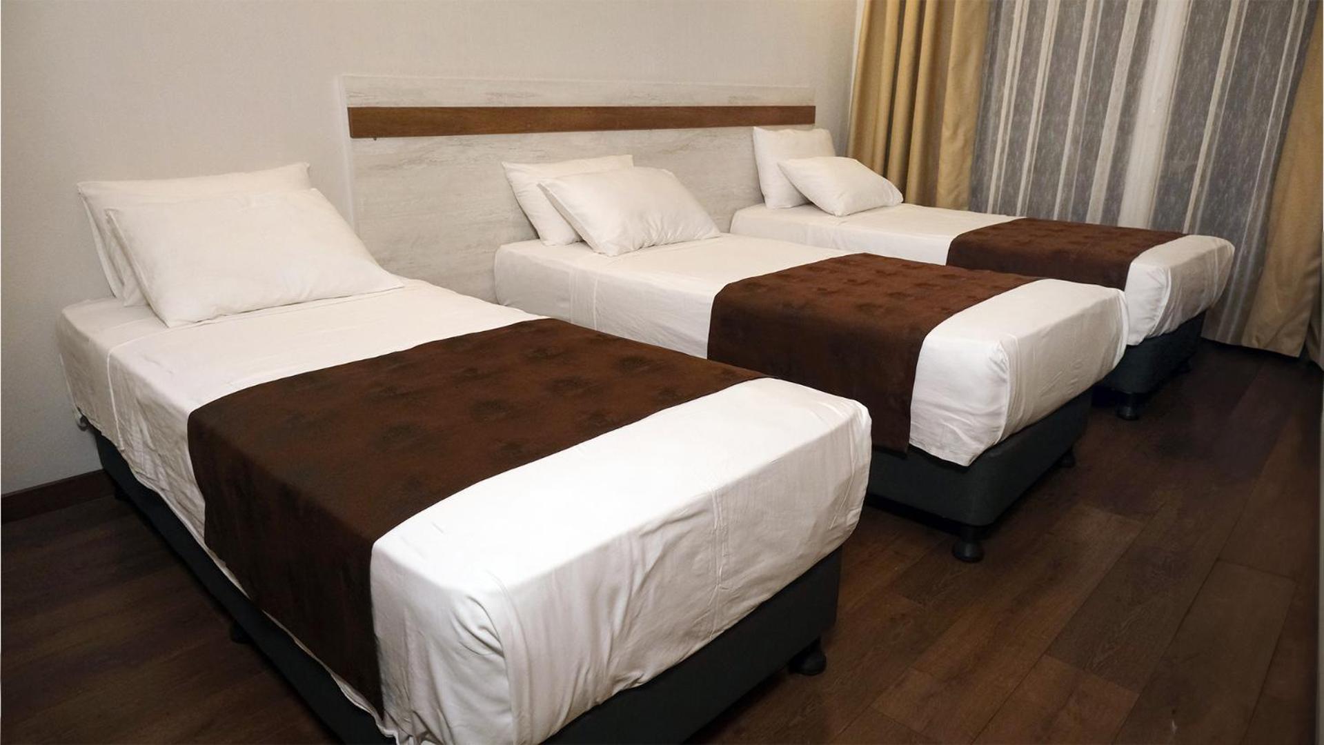 Standard Triple Room - Photo 8