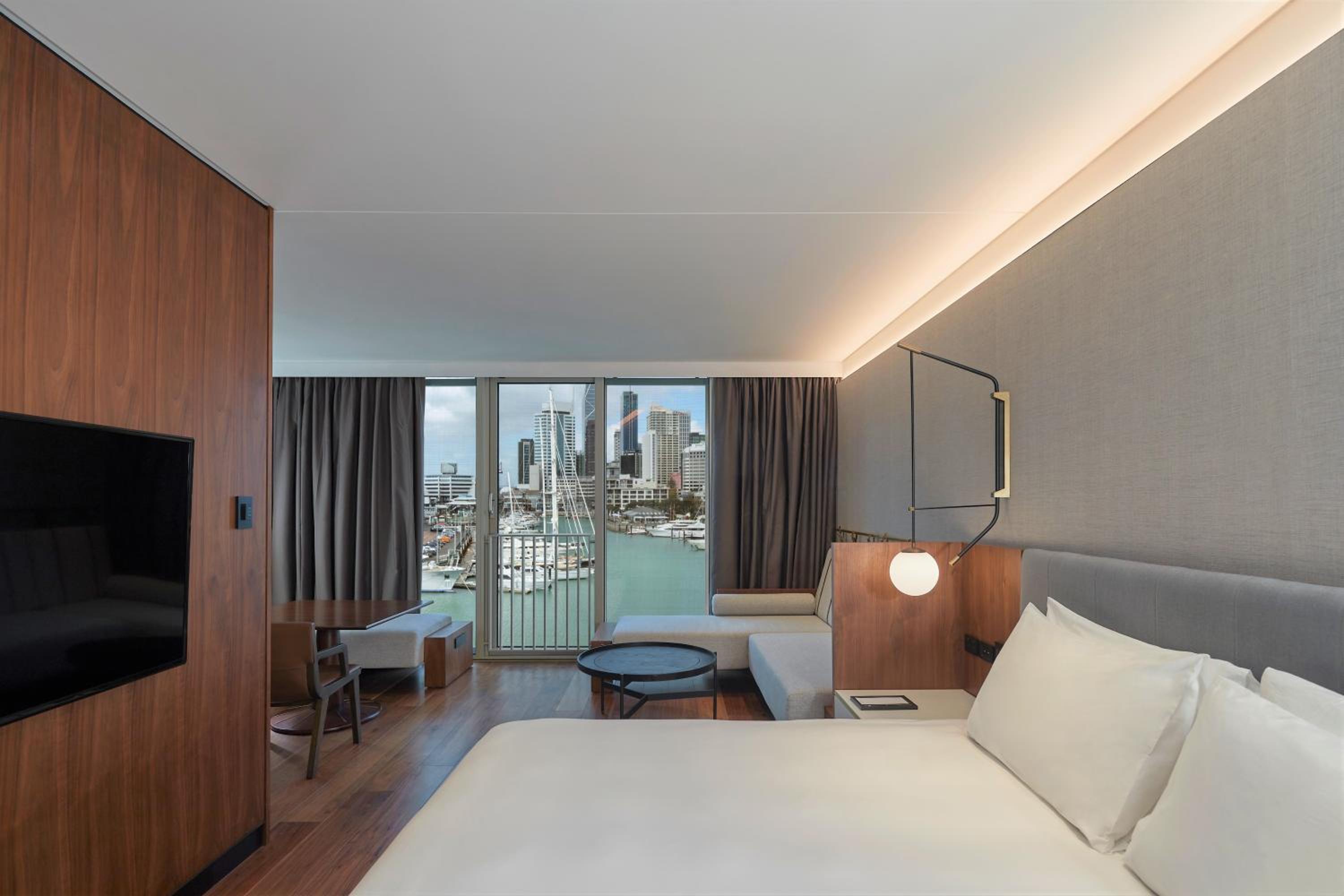 photo of a hotel room with a view of the city