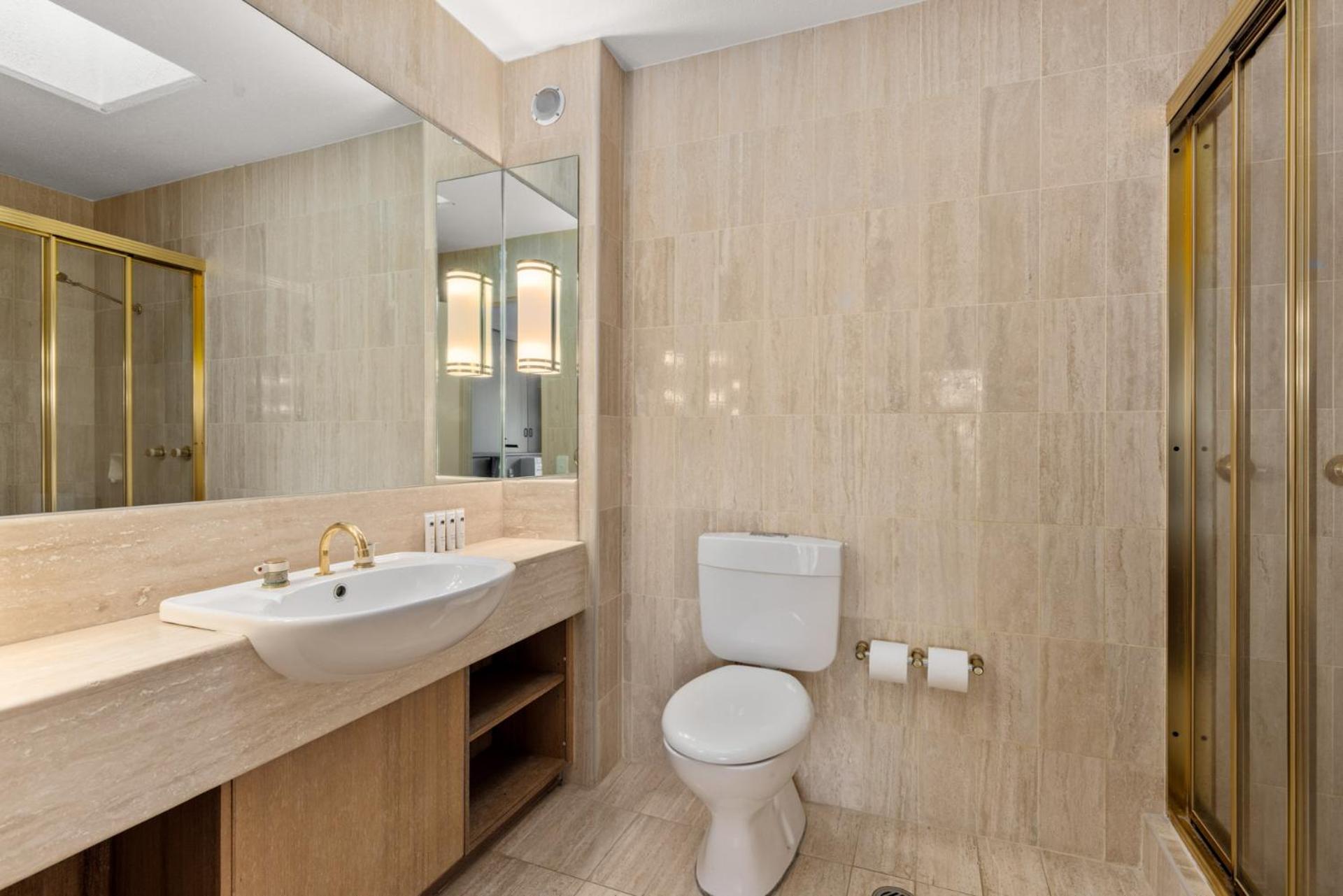 Three-Bedroom Apartment with Spa - Photo 15