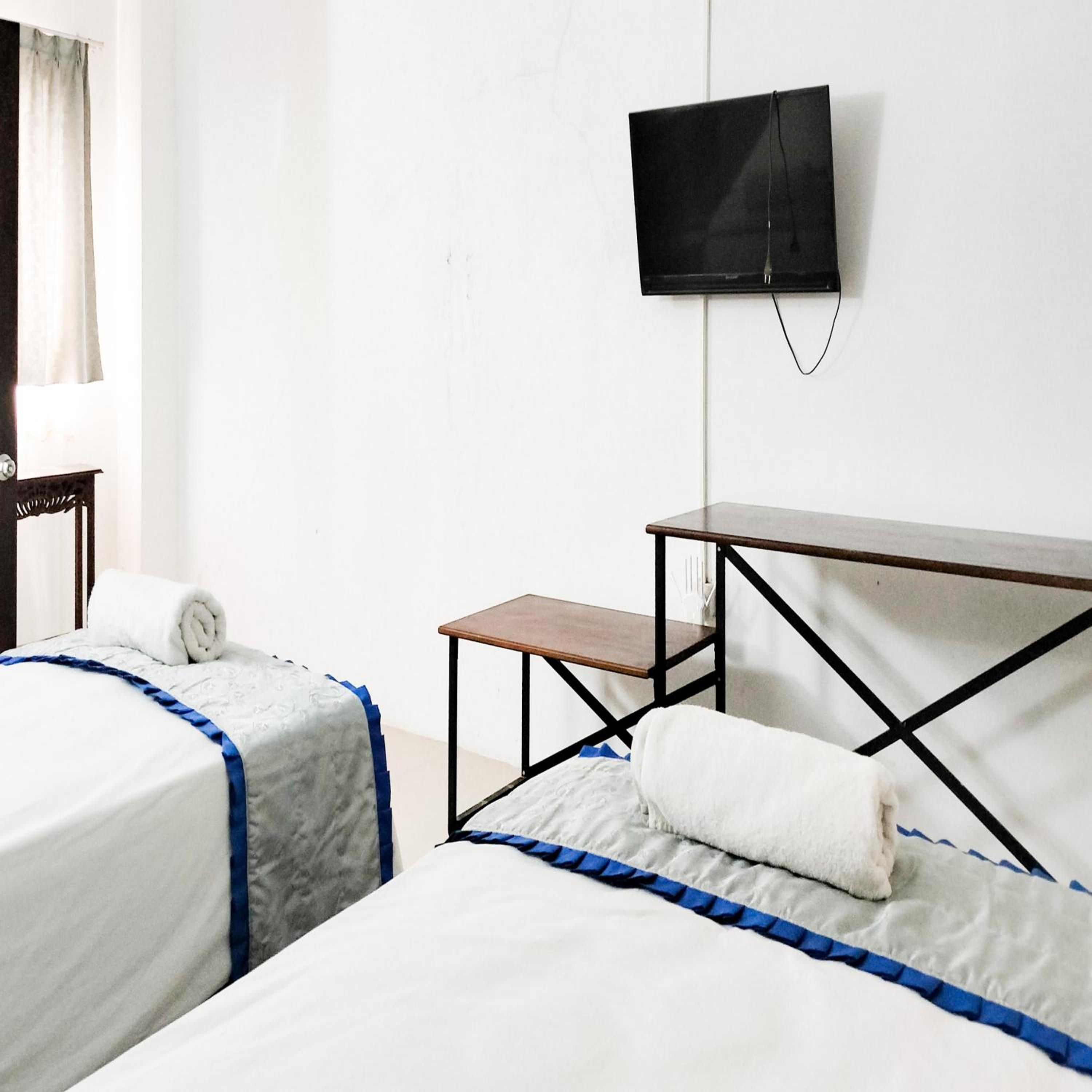 Standard Twin Room - Photo 4