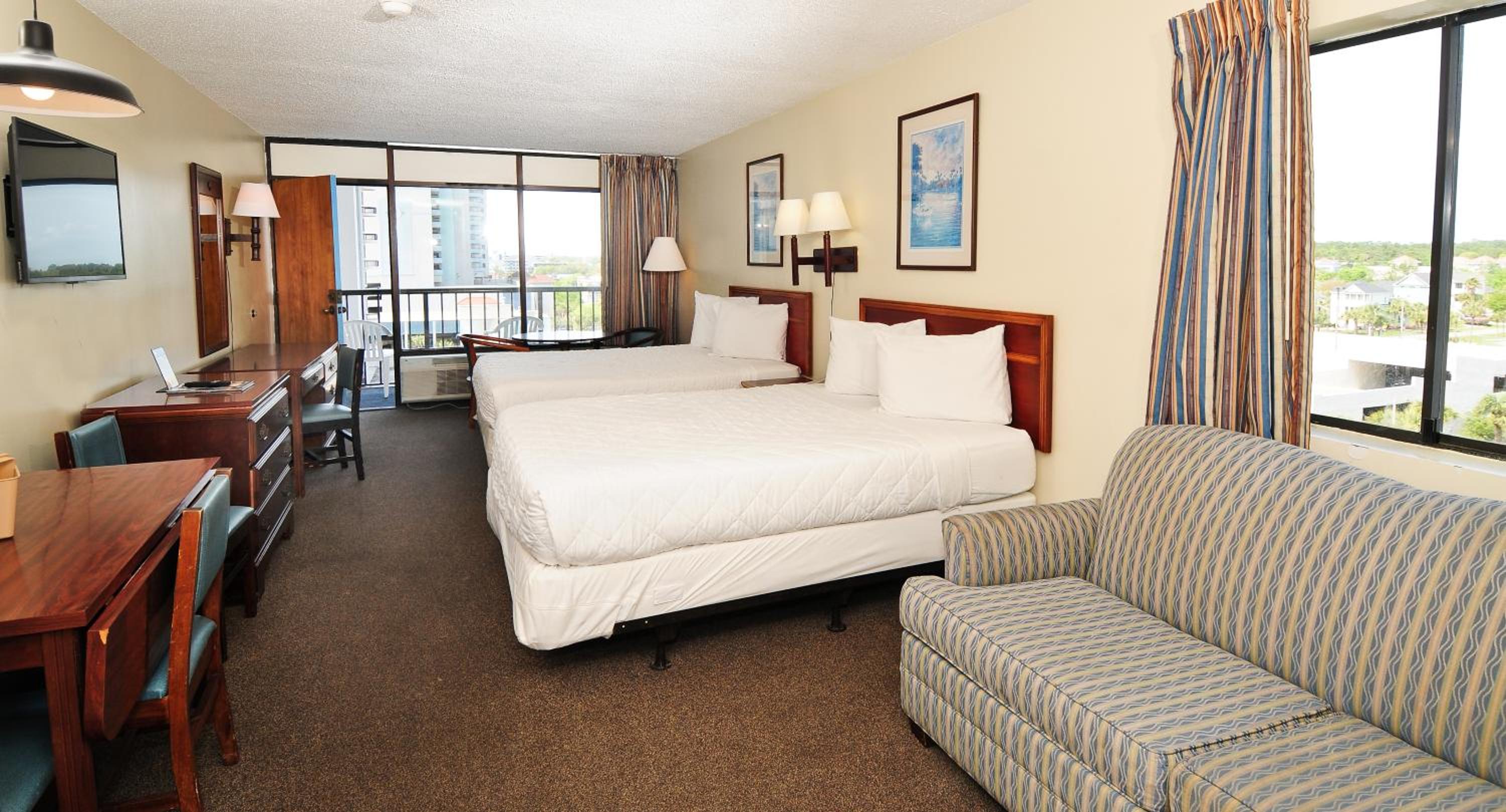 1 Room Side Ocean View Efficiency with 2 Queen Beds and 1 Sleeper Sofa - T3 photo 1