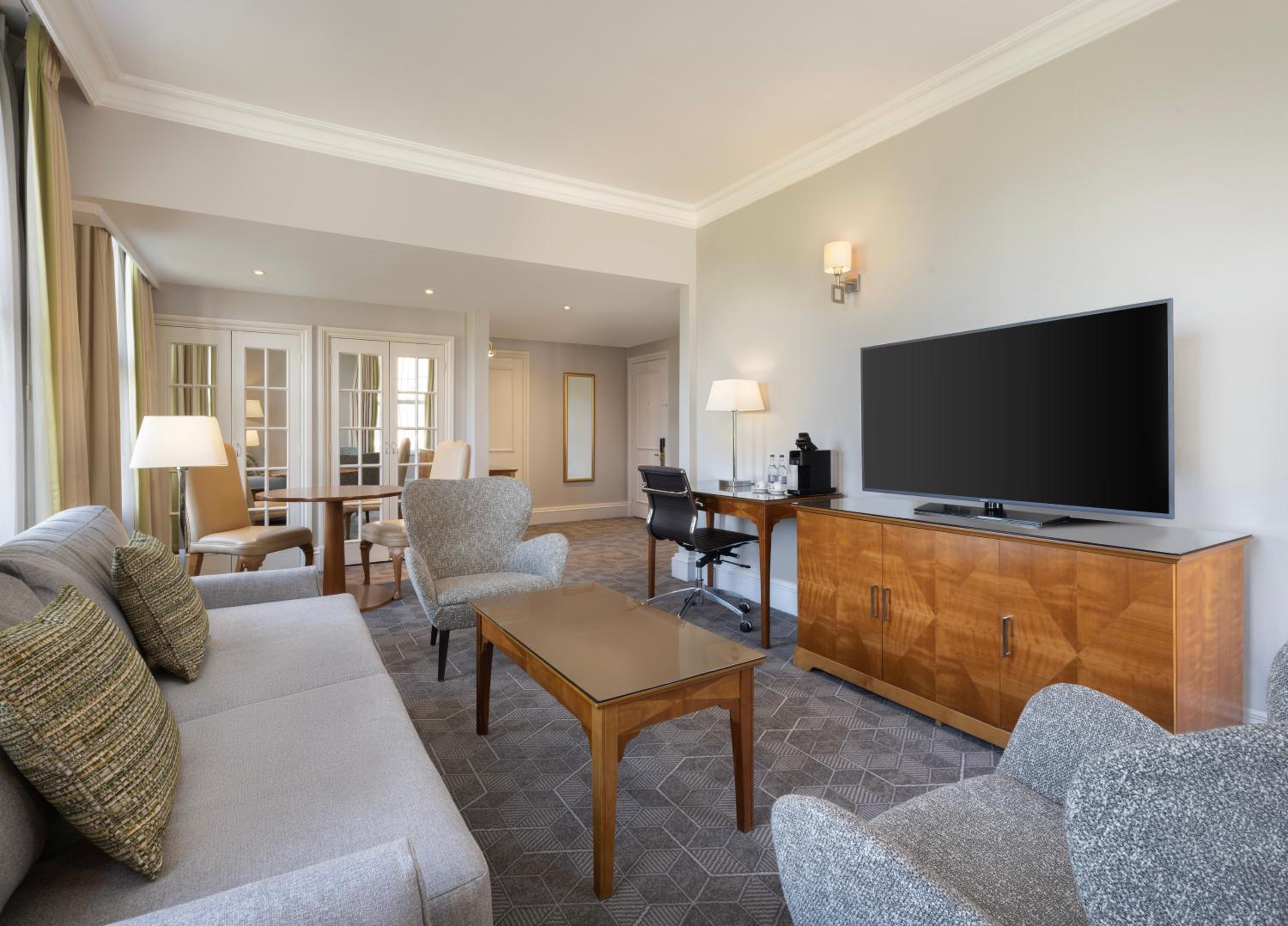 One-Bedroom Corner King Suite with Sofa Bed - Photo 1