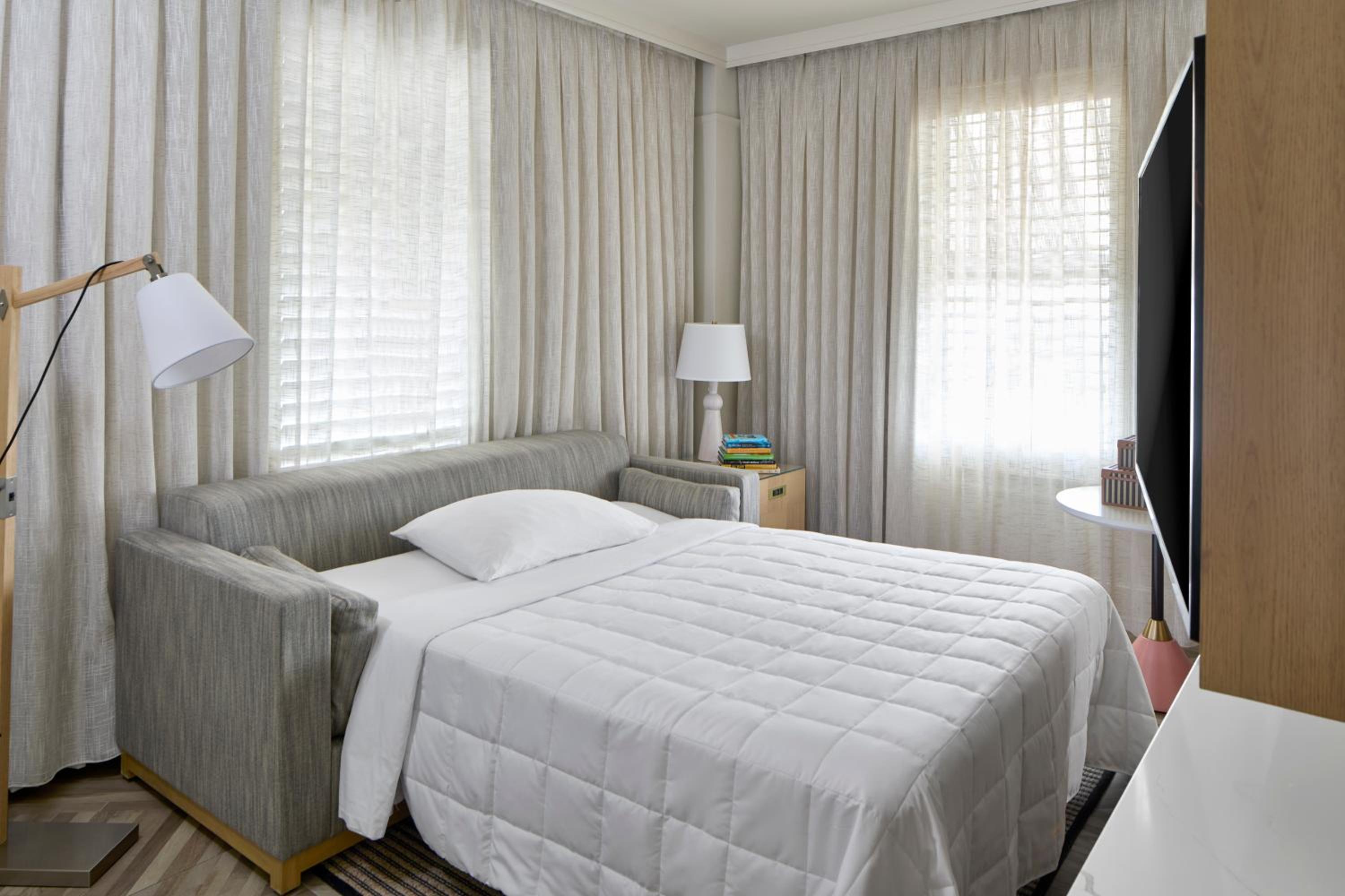 Junior King Suite with Sofa Bed - Photo 13
