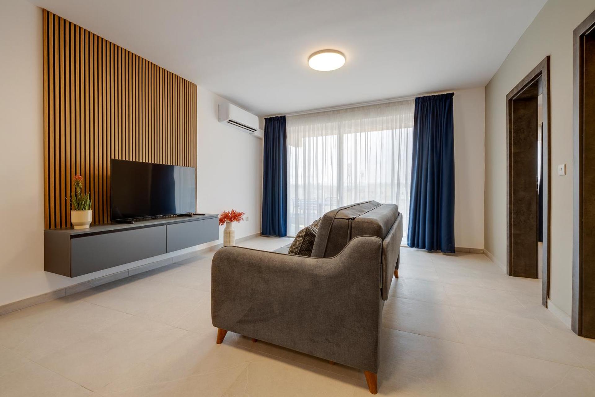 Three-Bedroom Apartment with Balcony