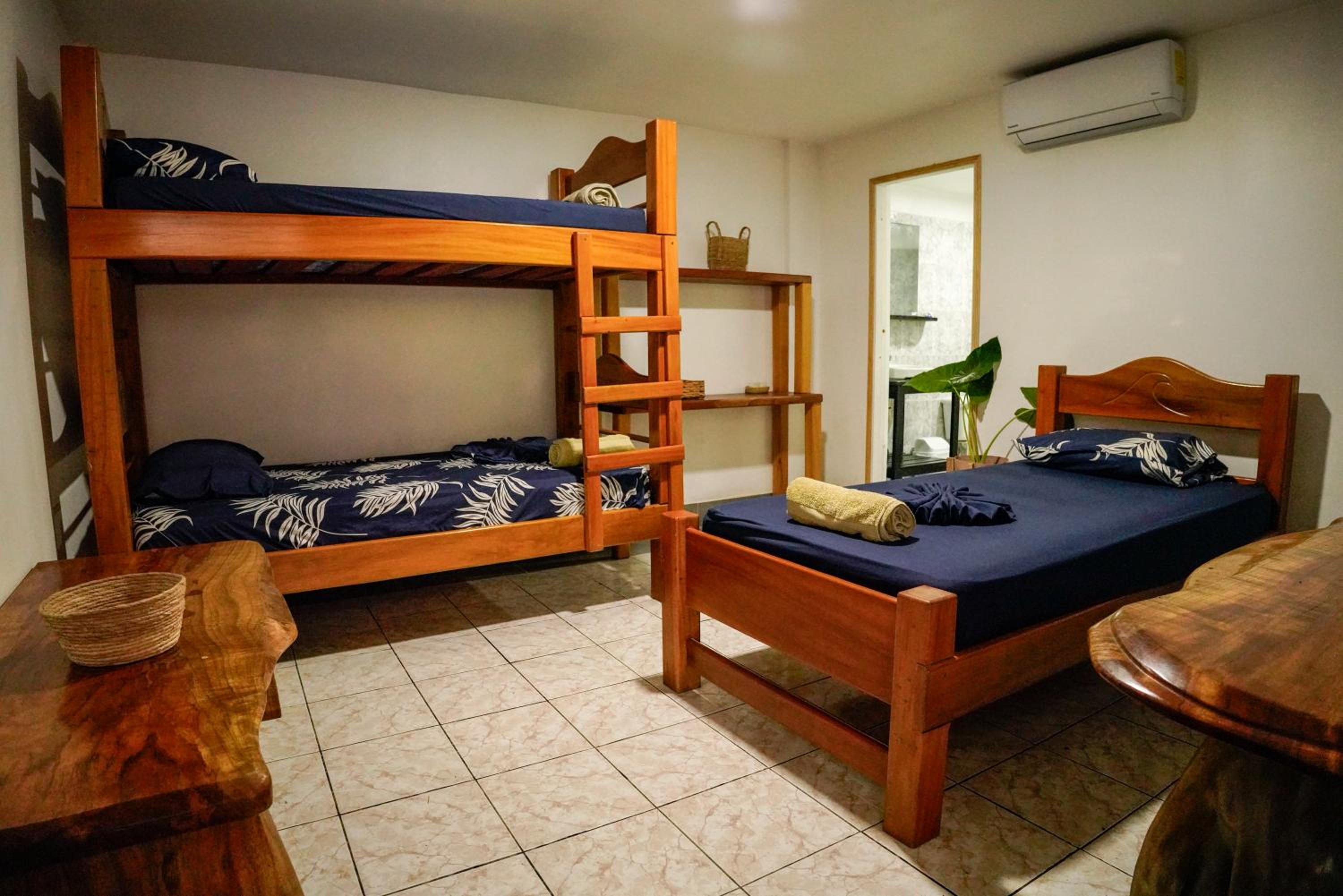 Single Bed in Dormitory Room