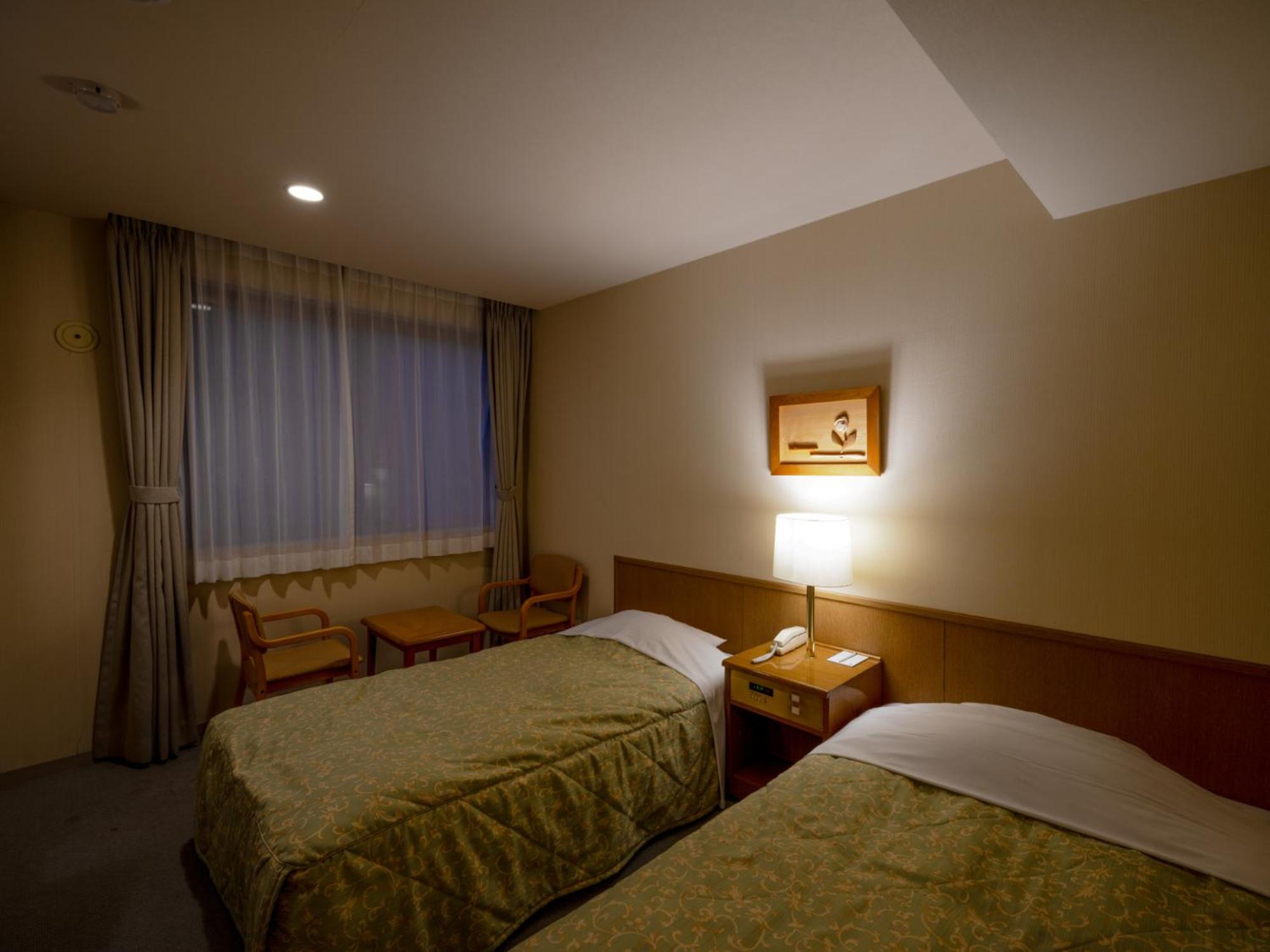 Twin Room - Photo 4