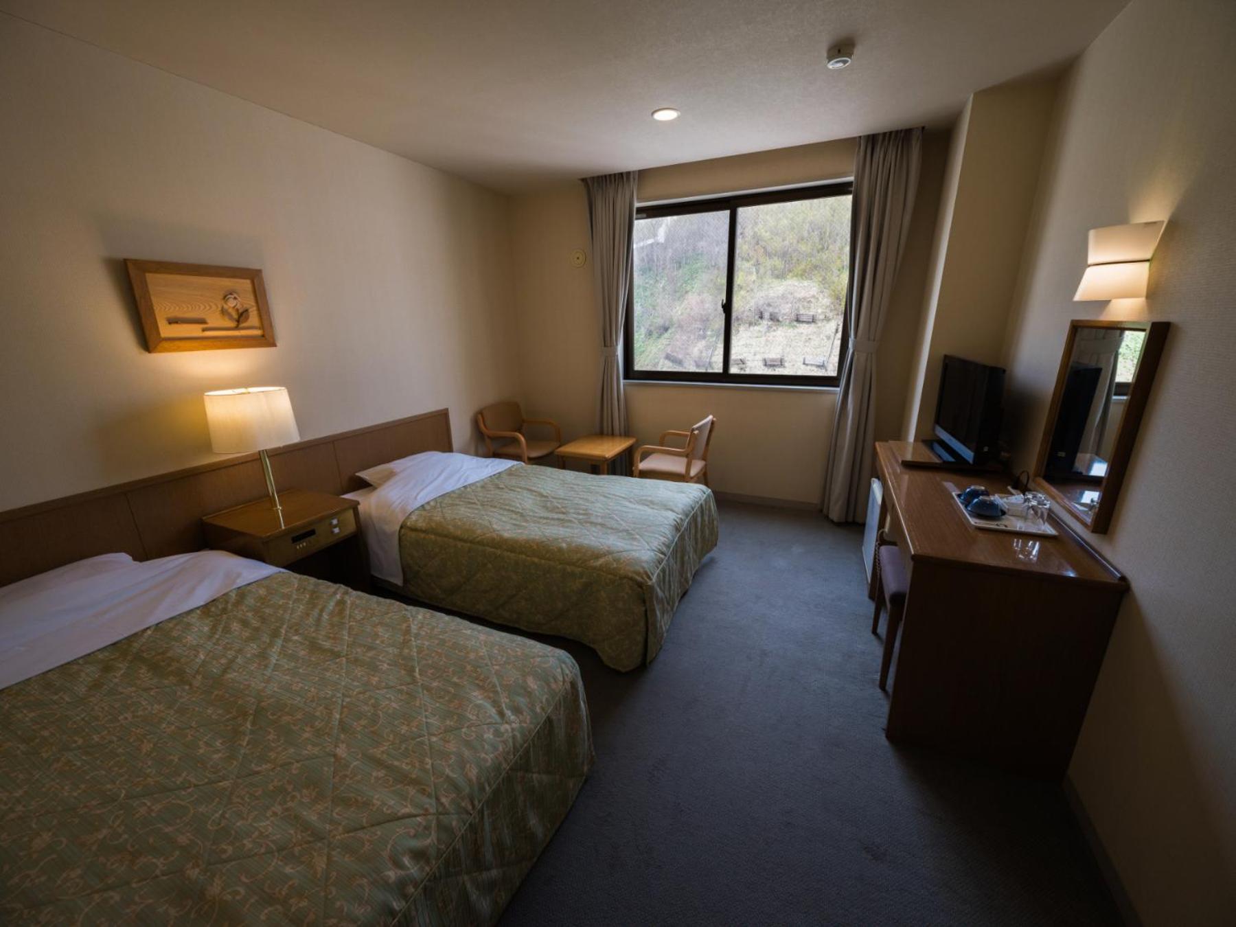 Twin Room - Photo 1