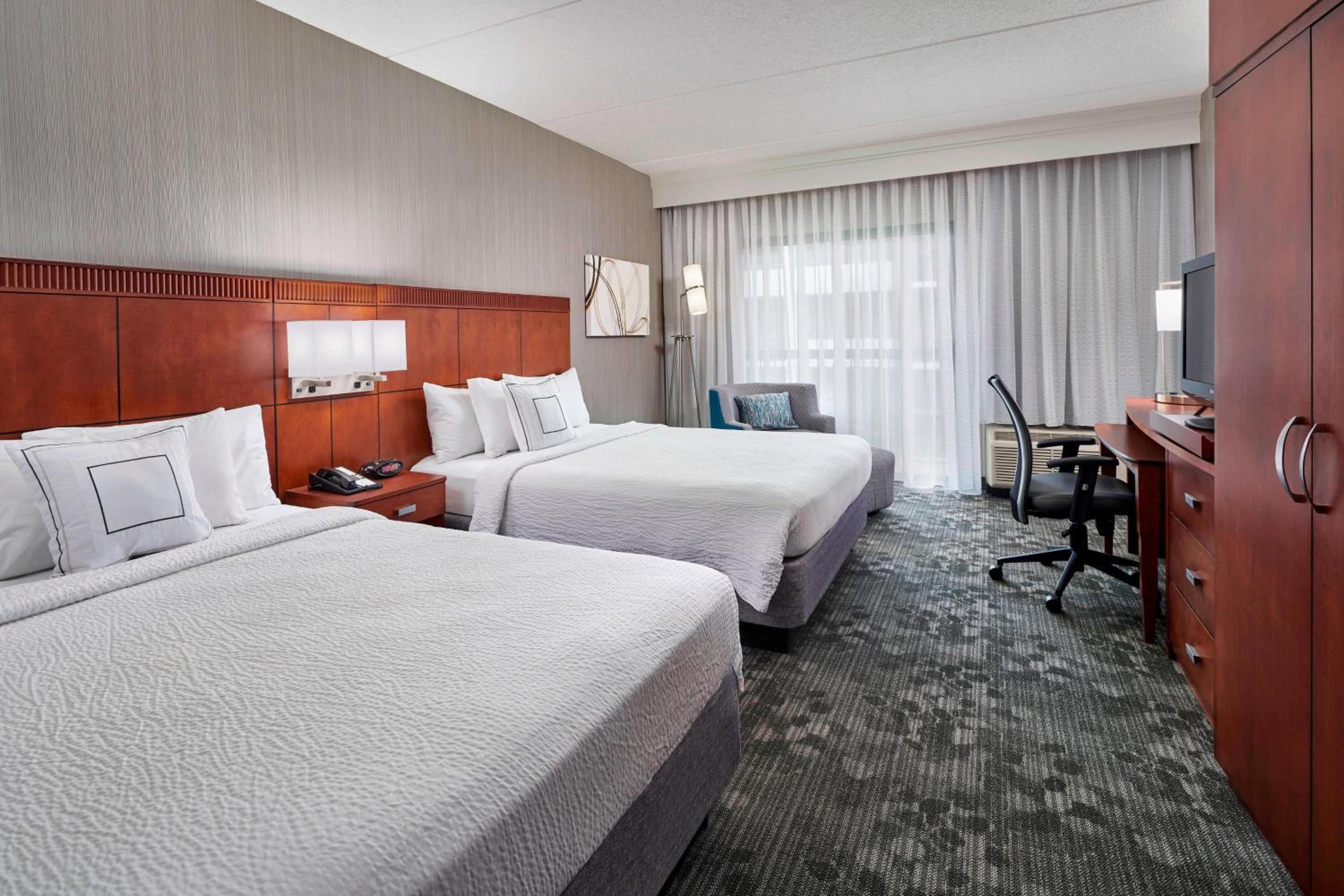Queen Room with Two Queen Beds - Photo 1
