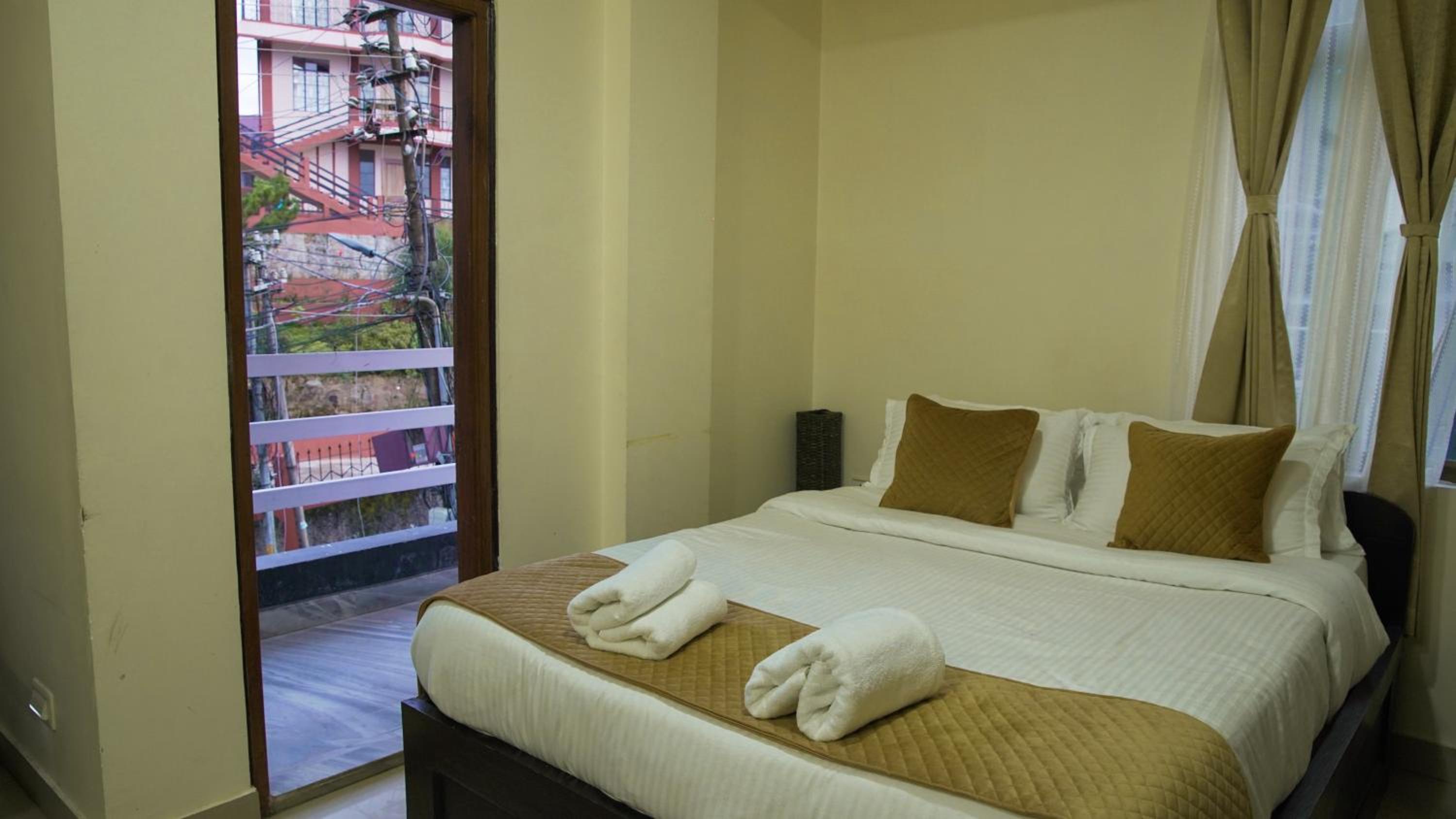 Deluxe Triple Room - Photo 25