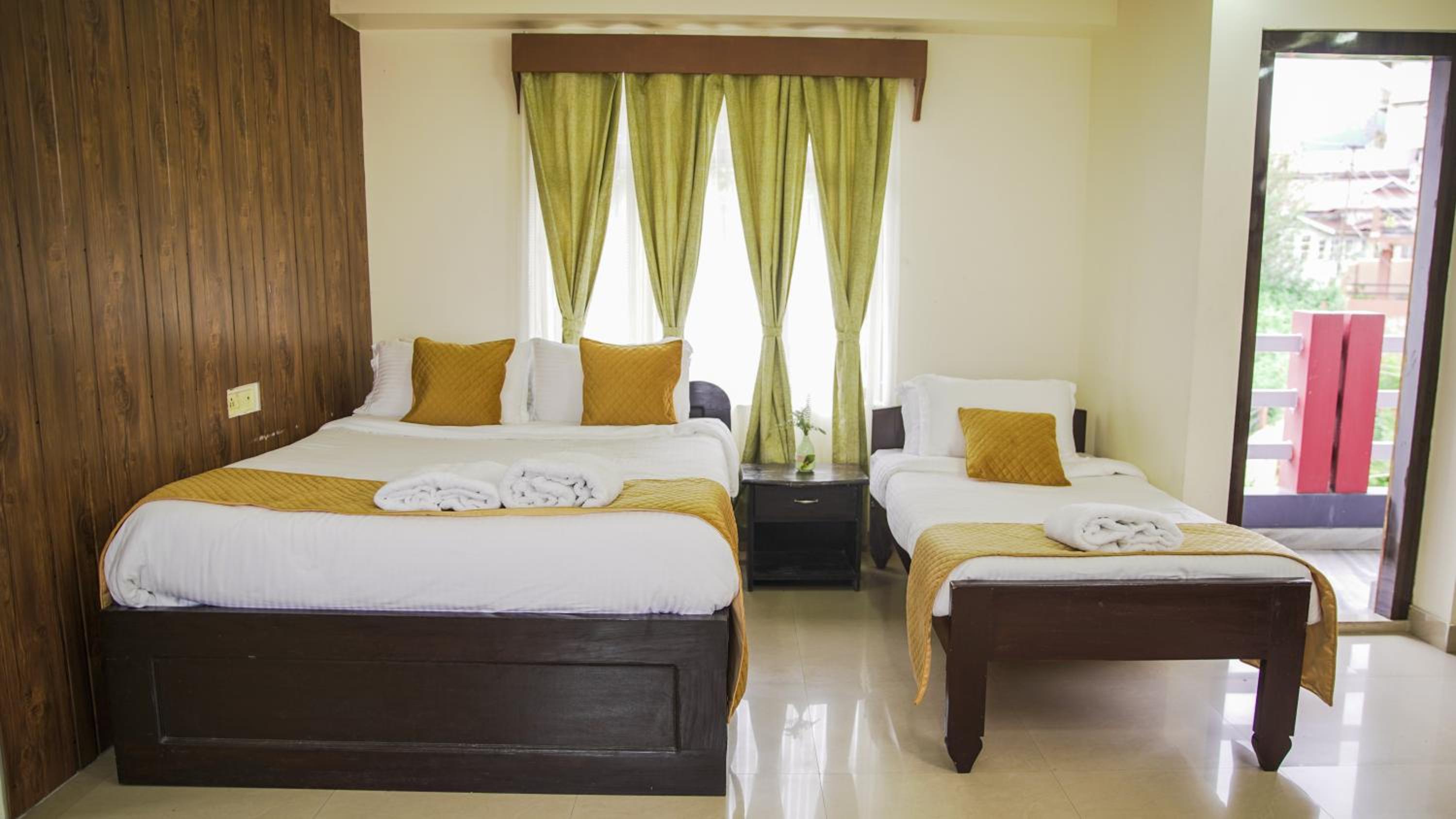 Deluxe Triple Room - Photo 17