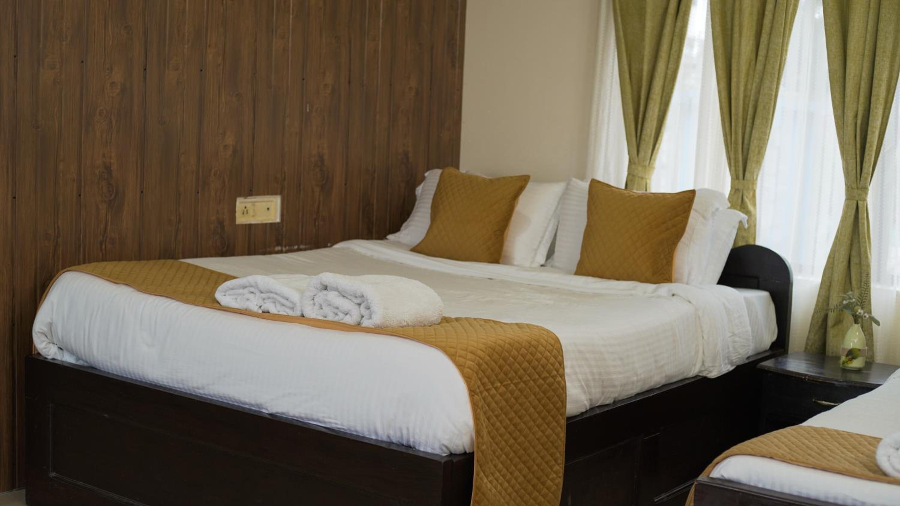 Deluxe Triple Room - Photo 13