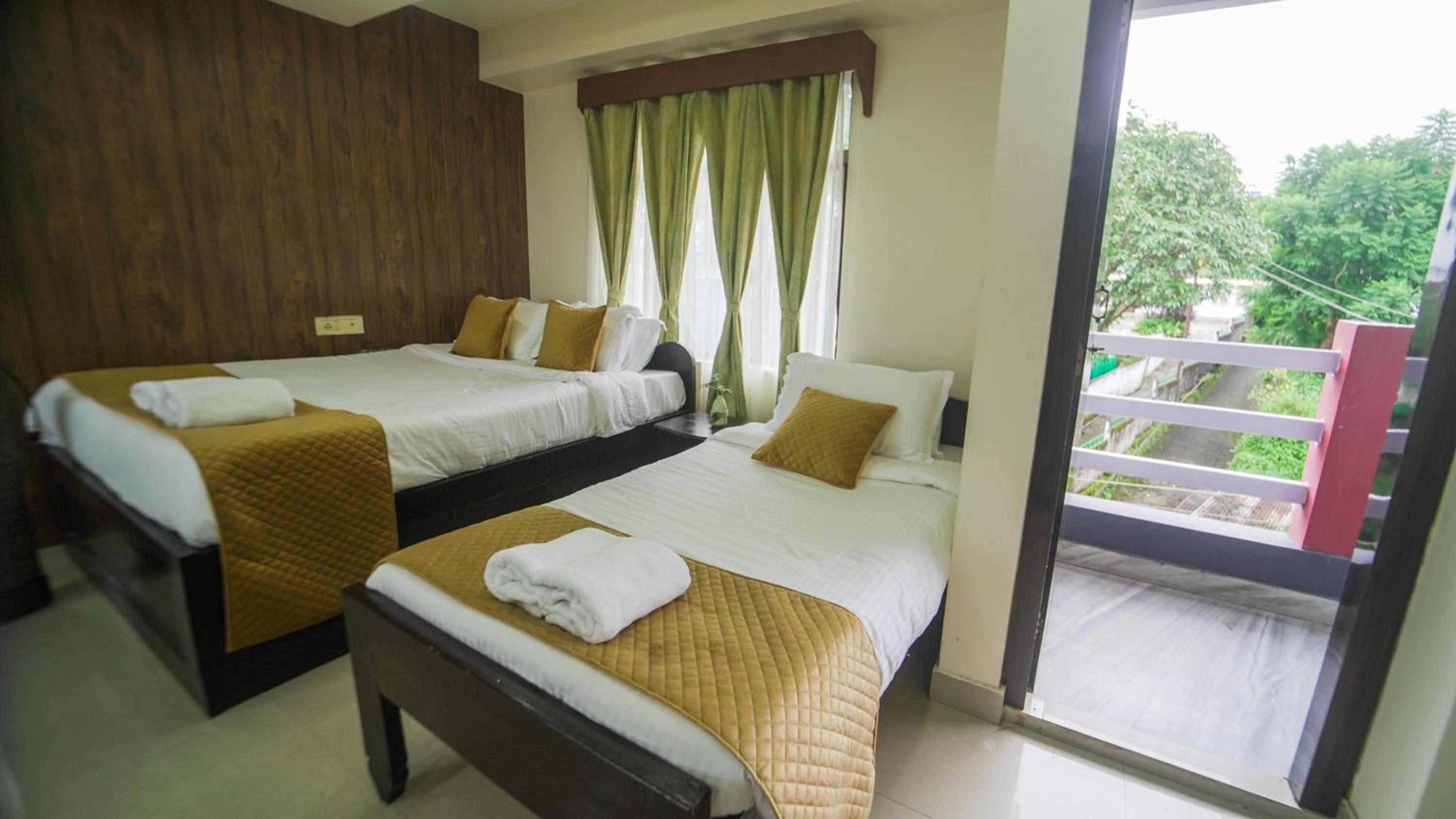 Deluxe Triple Room - Photo 8