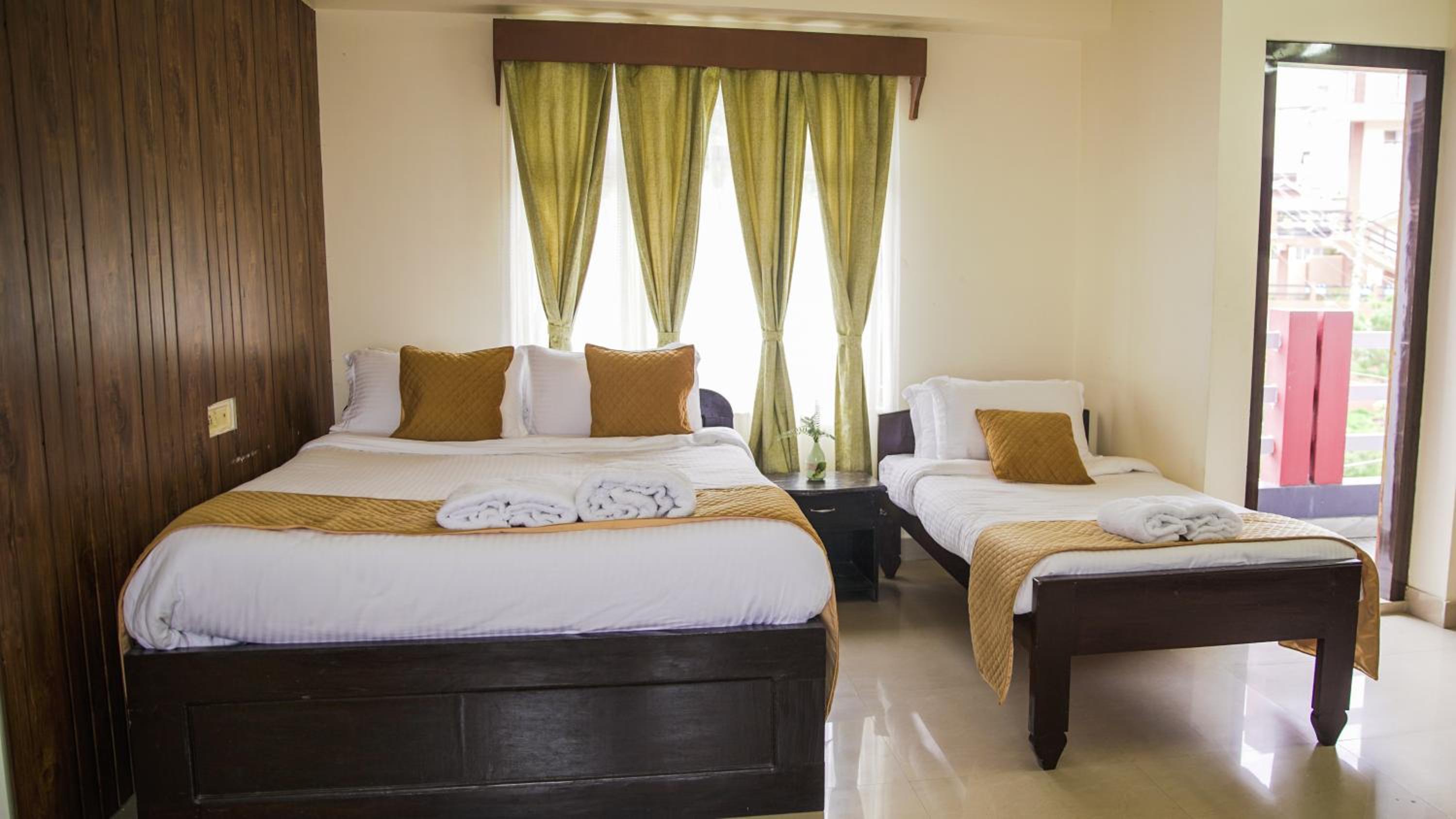 Deluxe Triple Room - Photo 1