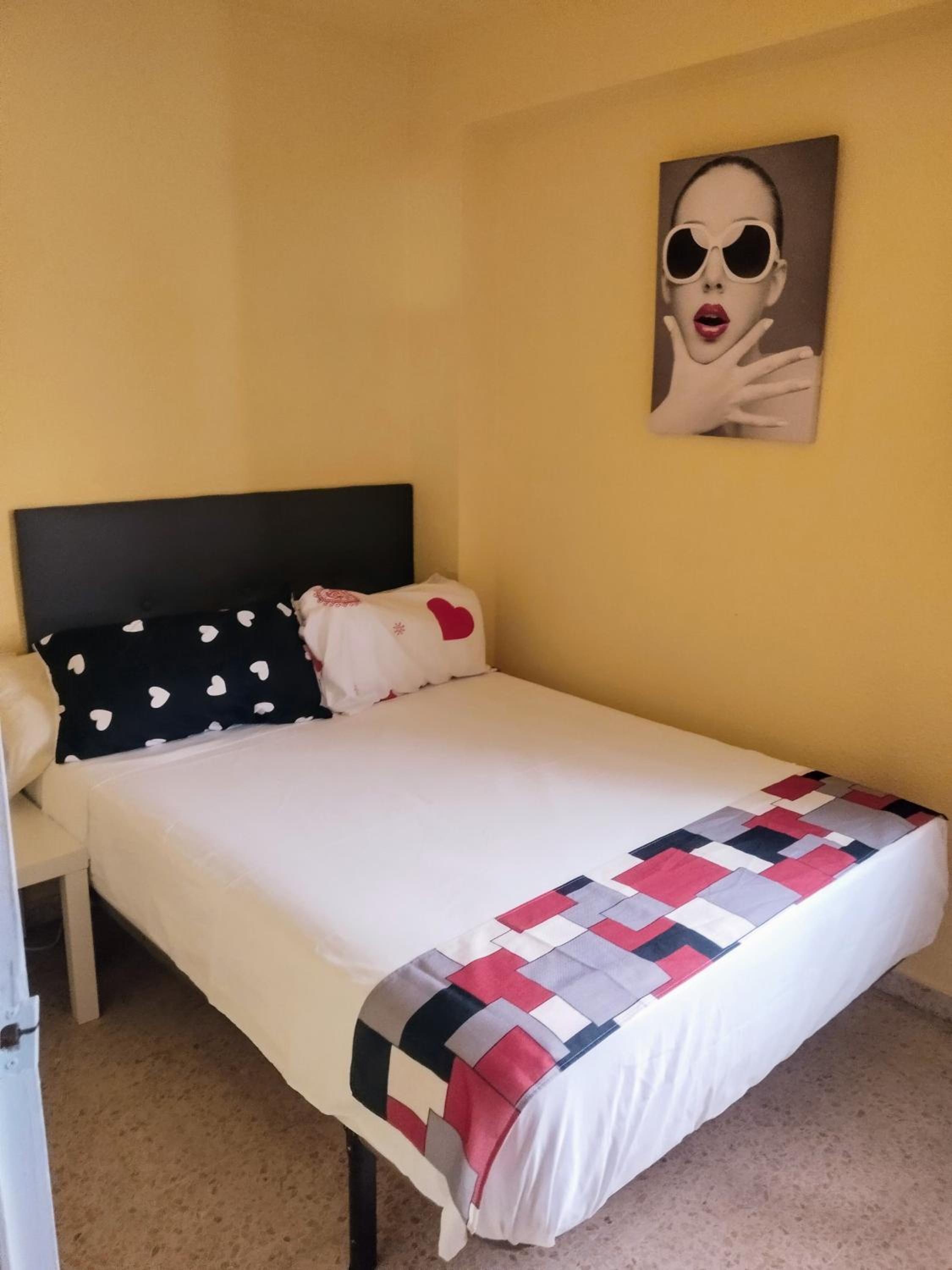 Habitación doble con baño compartido