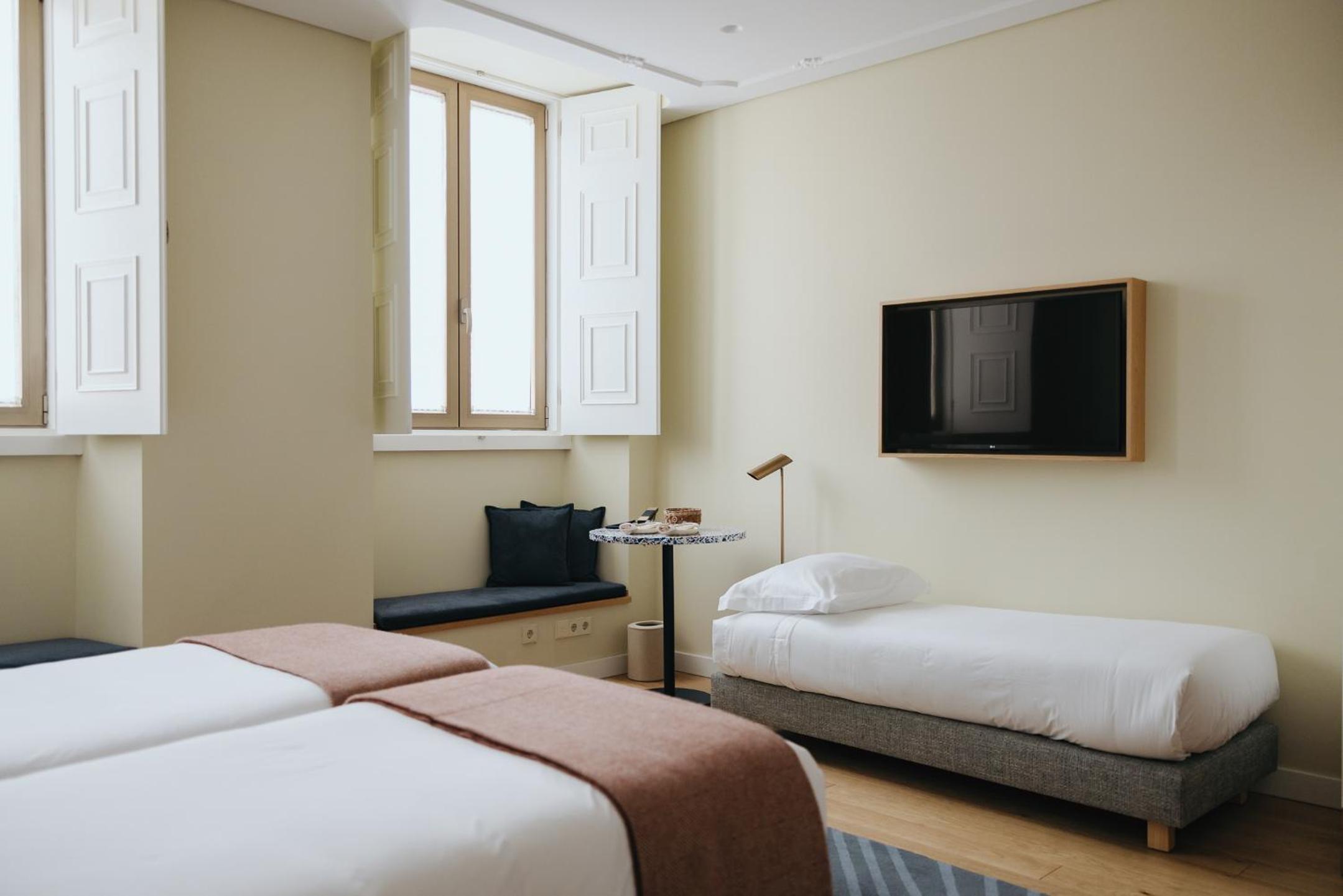 Deluxe Triple Room - Photo 1