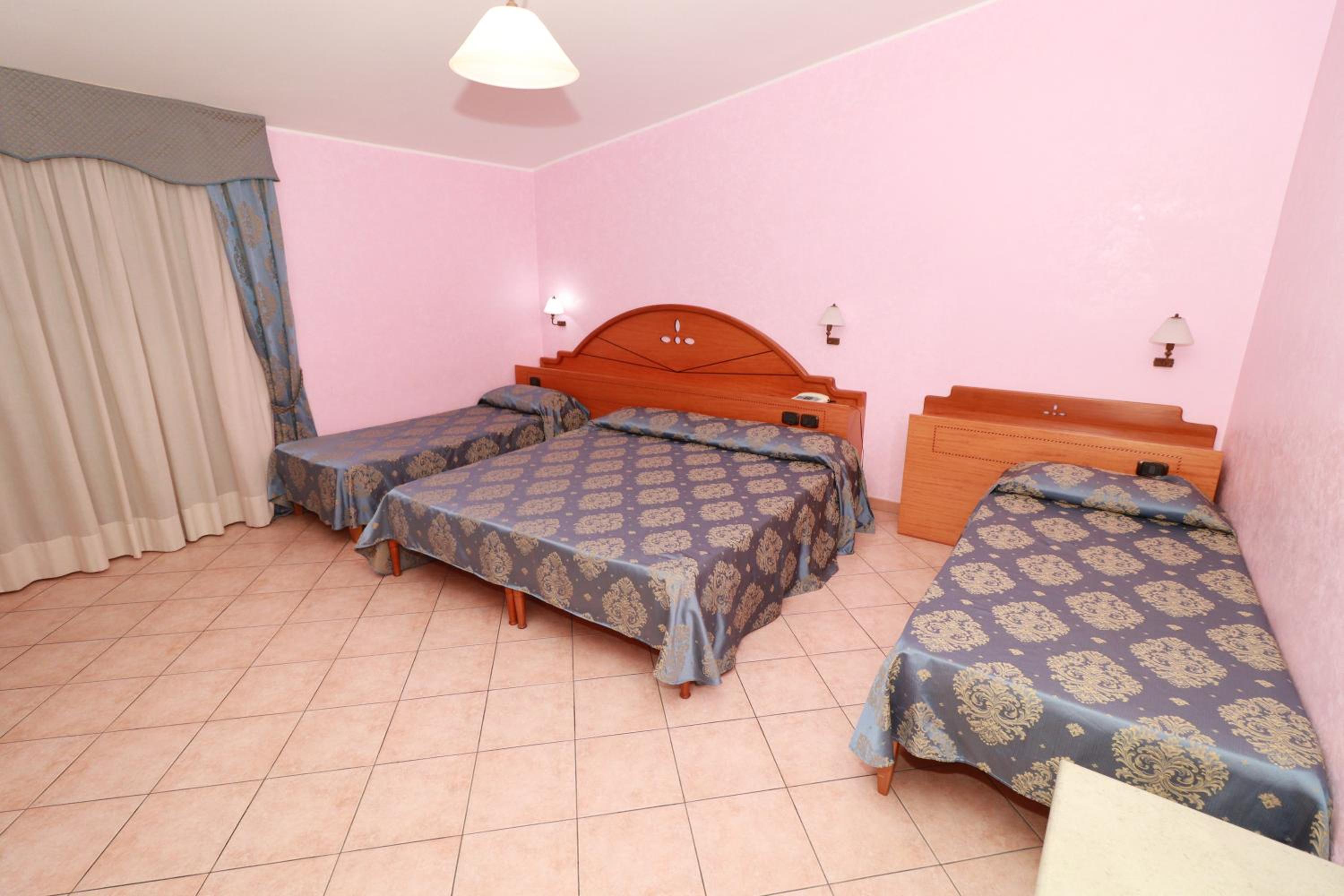 Quadruple Room with Balcony