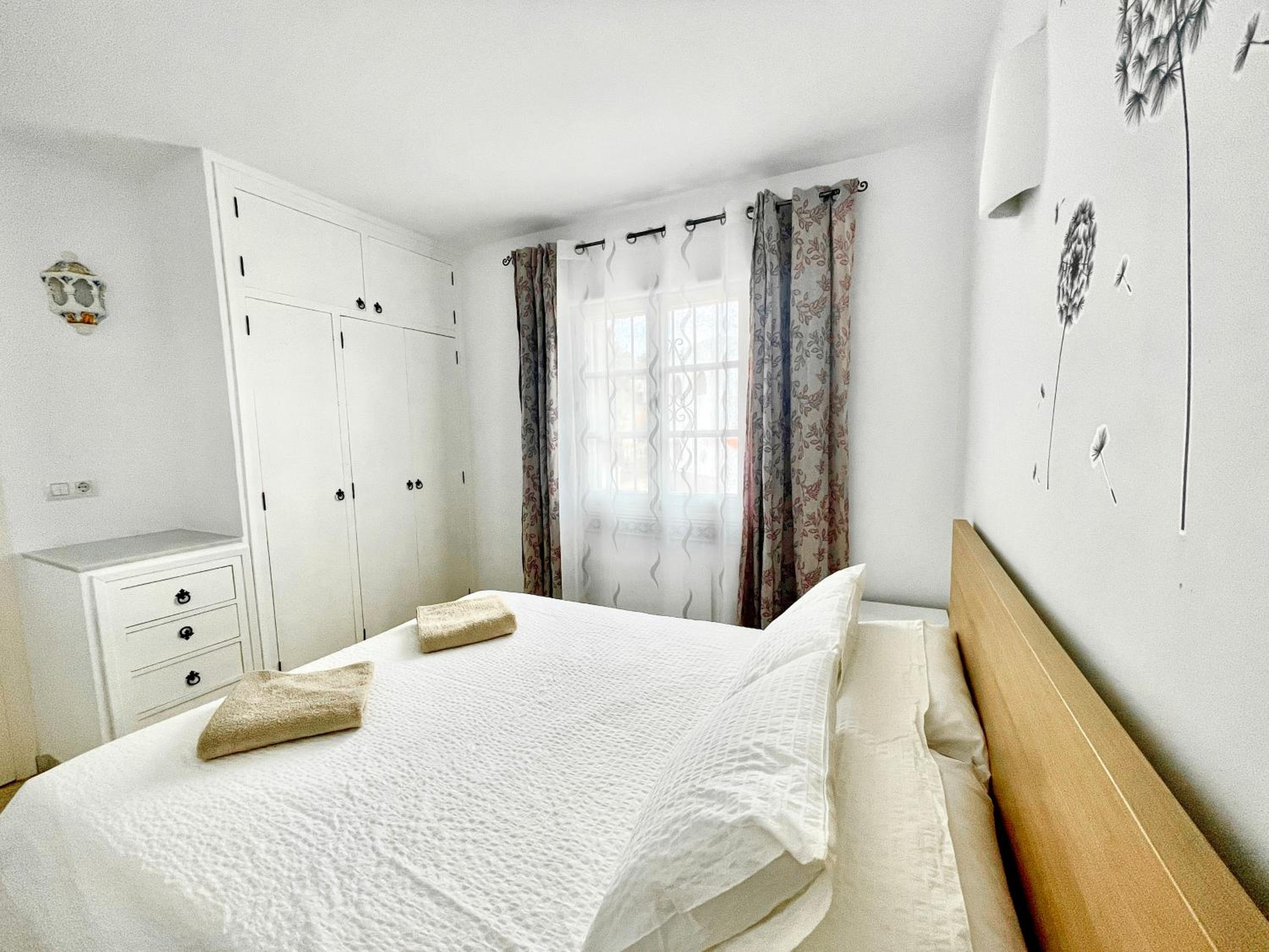 One-Bedroom Apartment with Balcony and Mountain View  