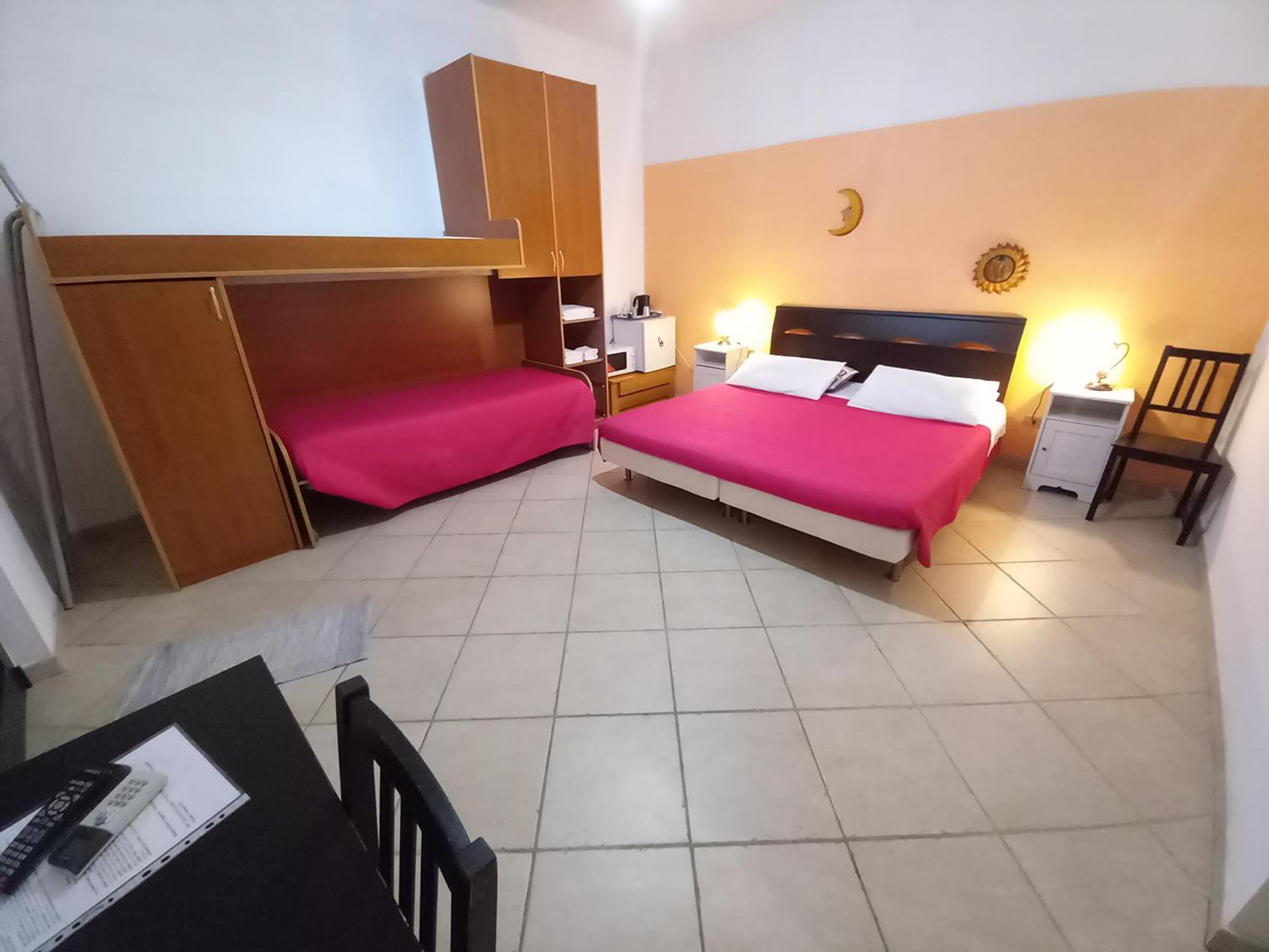 Quadruple Room - Photo 1