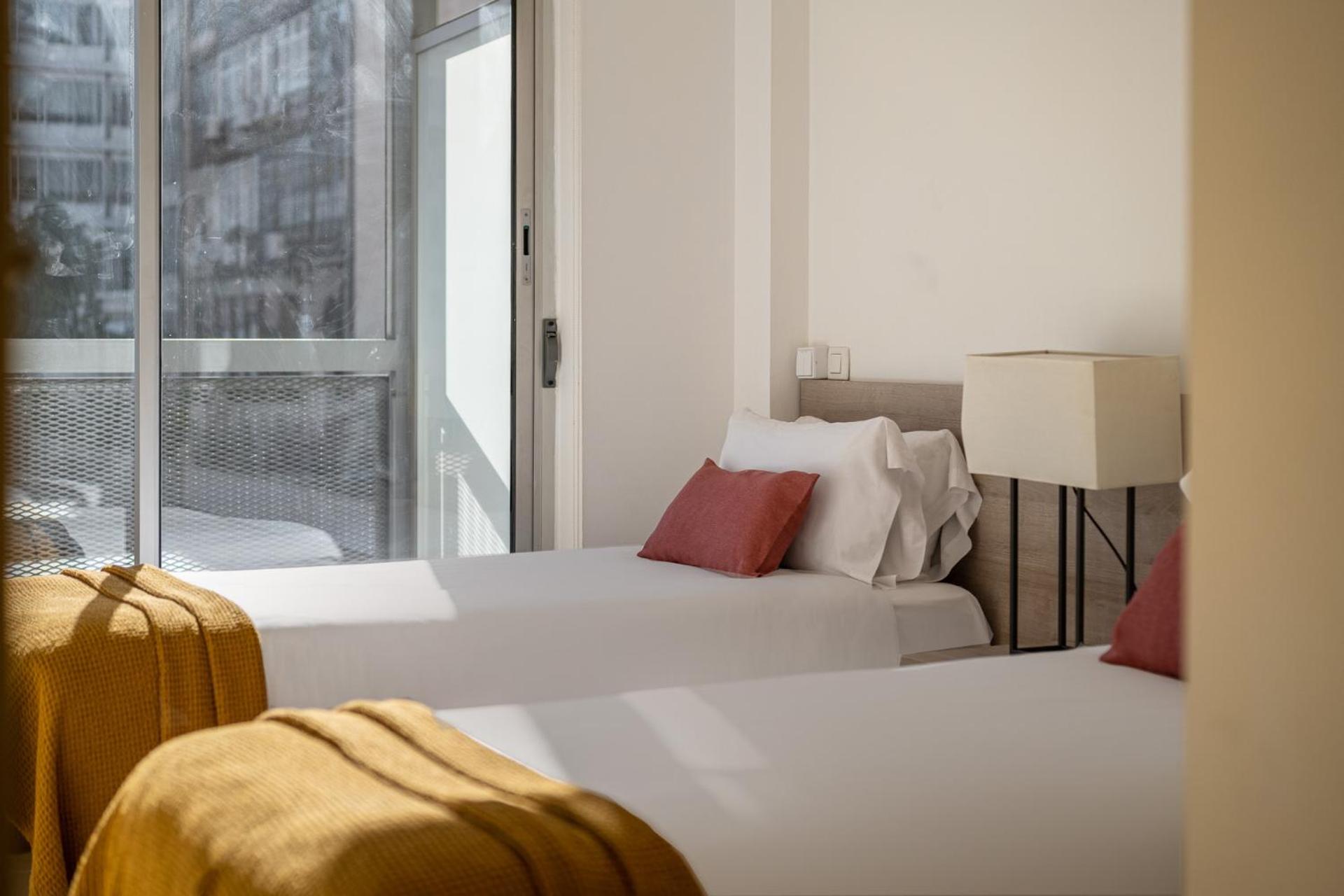 Three-Bedroom Apartment with Balcony photo 2