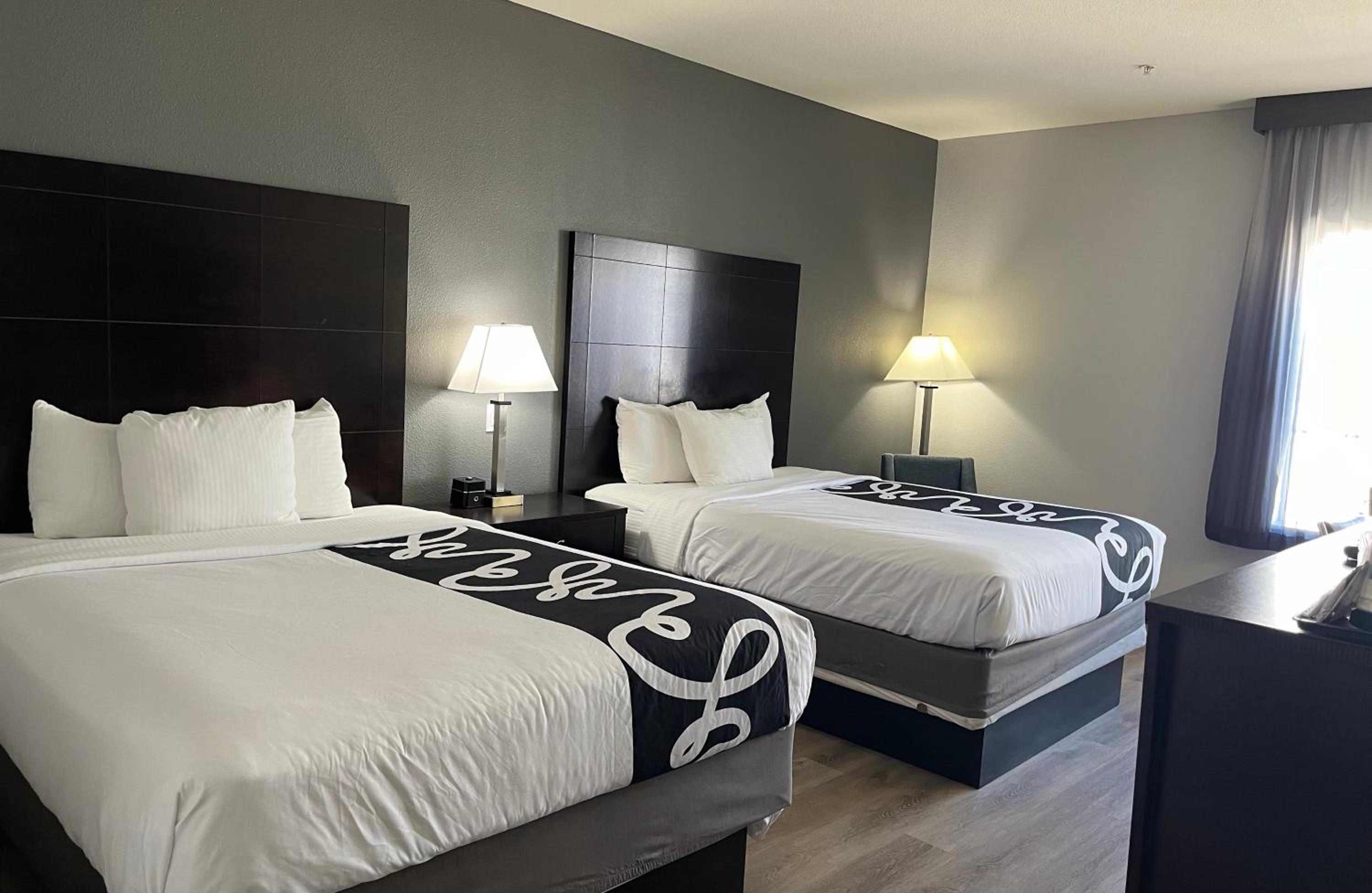 Queen Room with Two Queen Beds - Photo 1