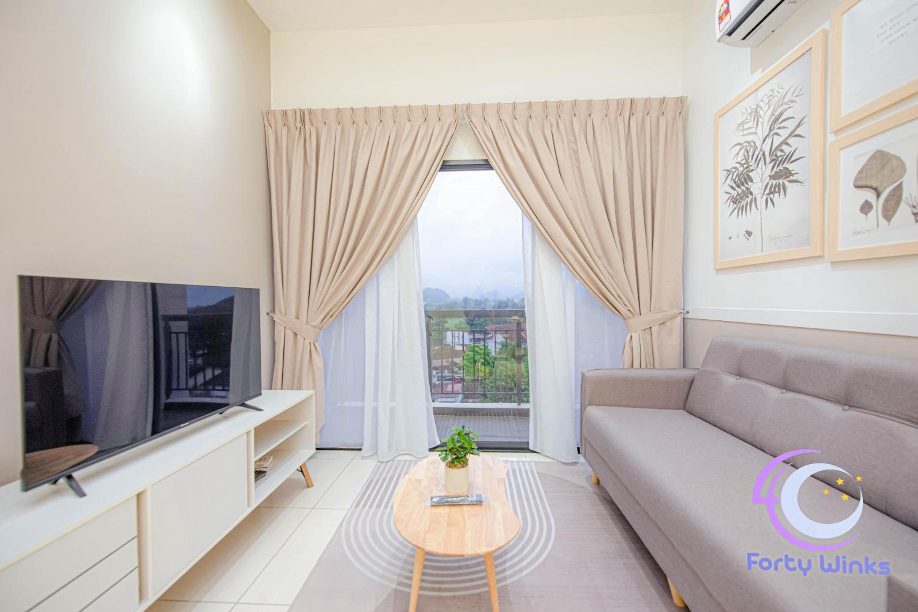 Three-Bedroom Apartment - Photo 1
