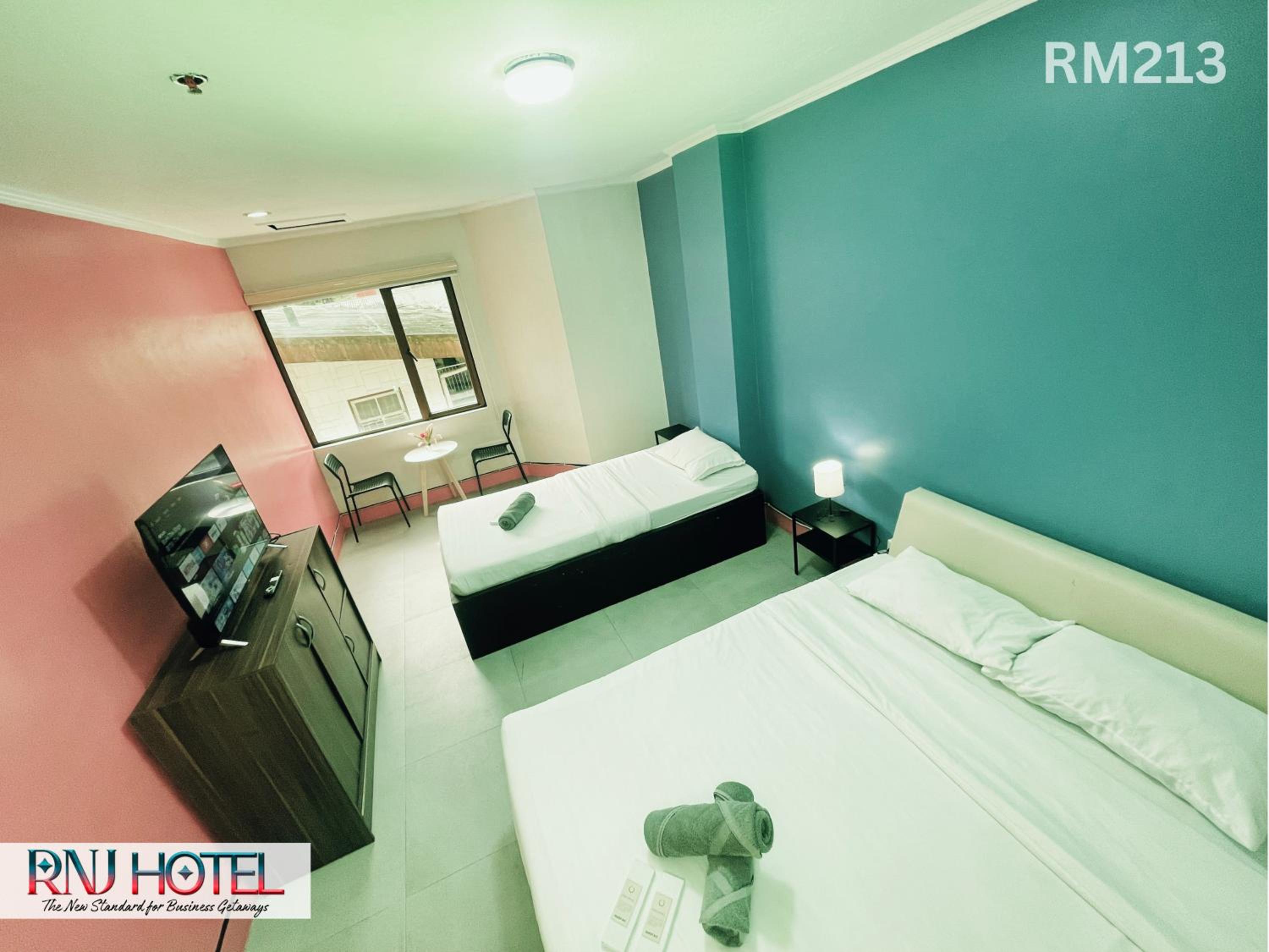 Deluxe Triple Room