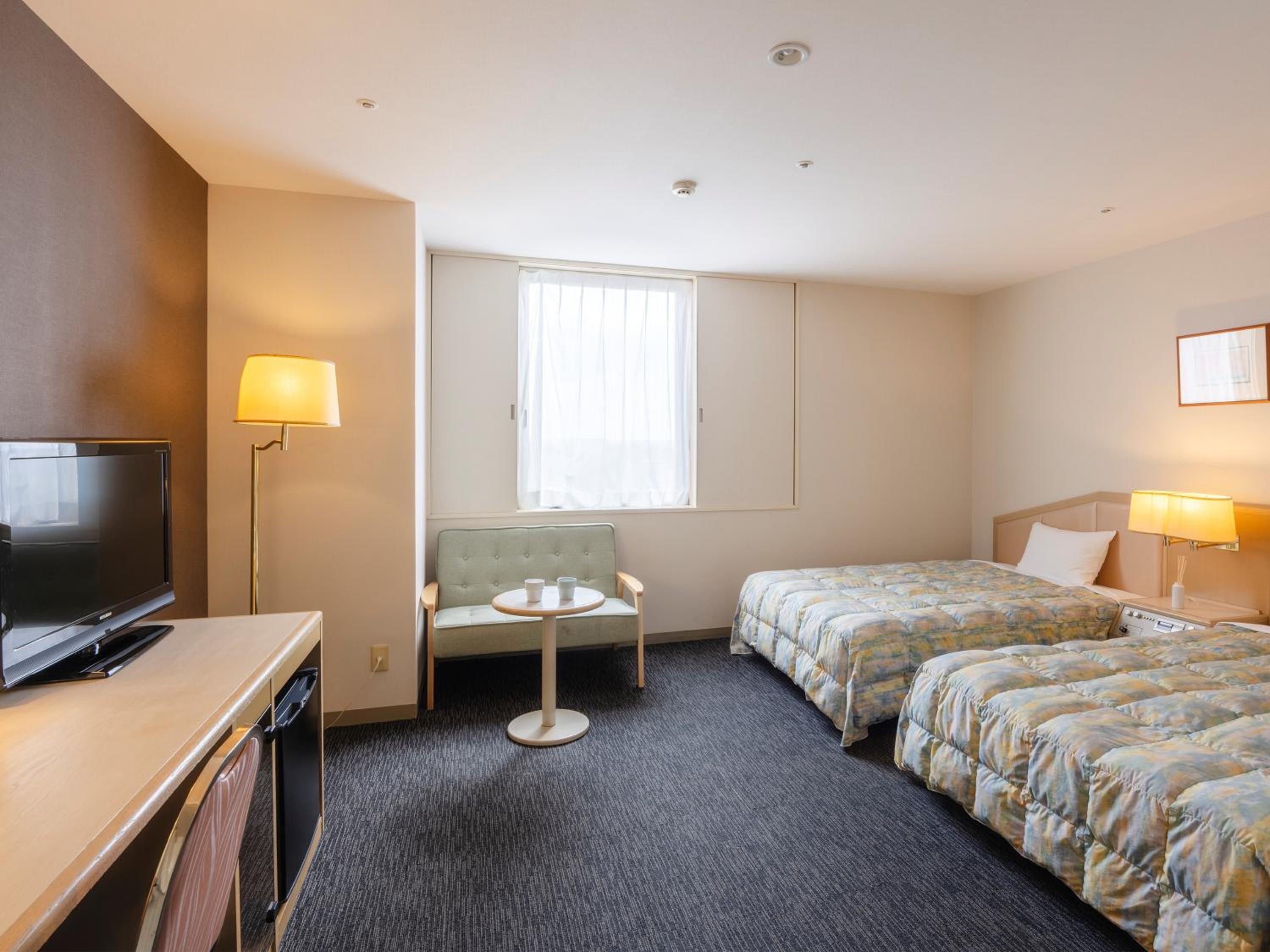 Twin Room - Non-Smoking - Photo 1