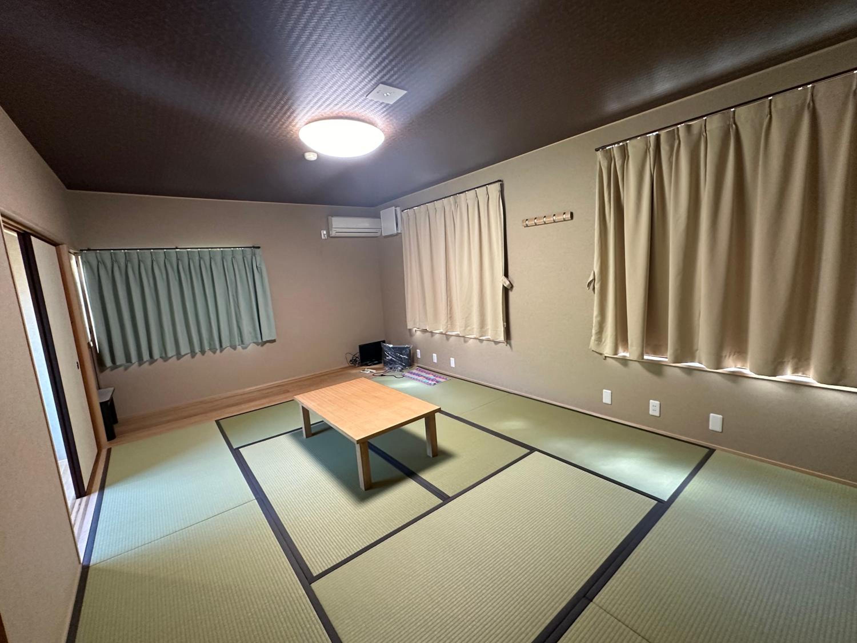 Quadruple Room with Shared Bathroom