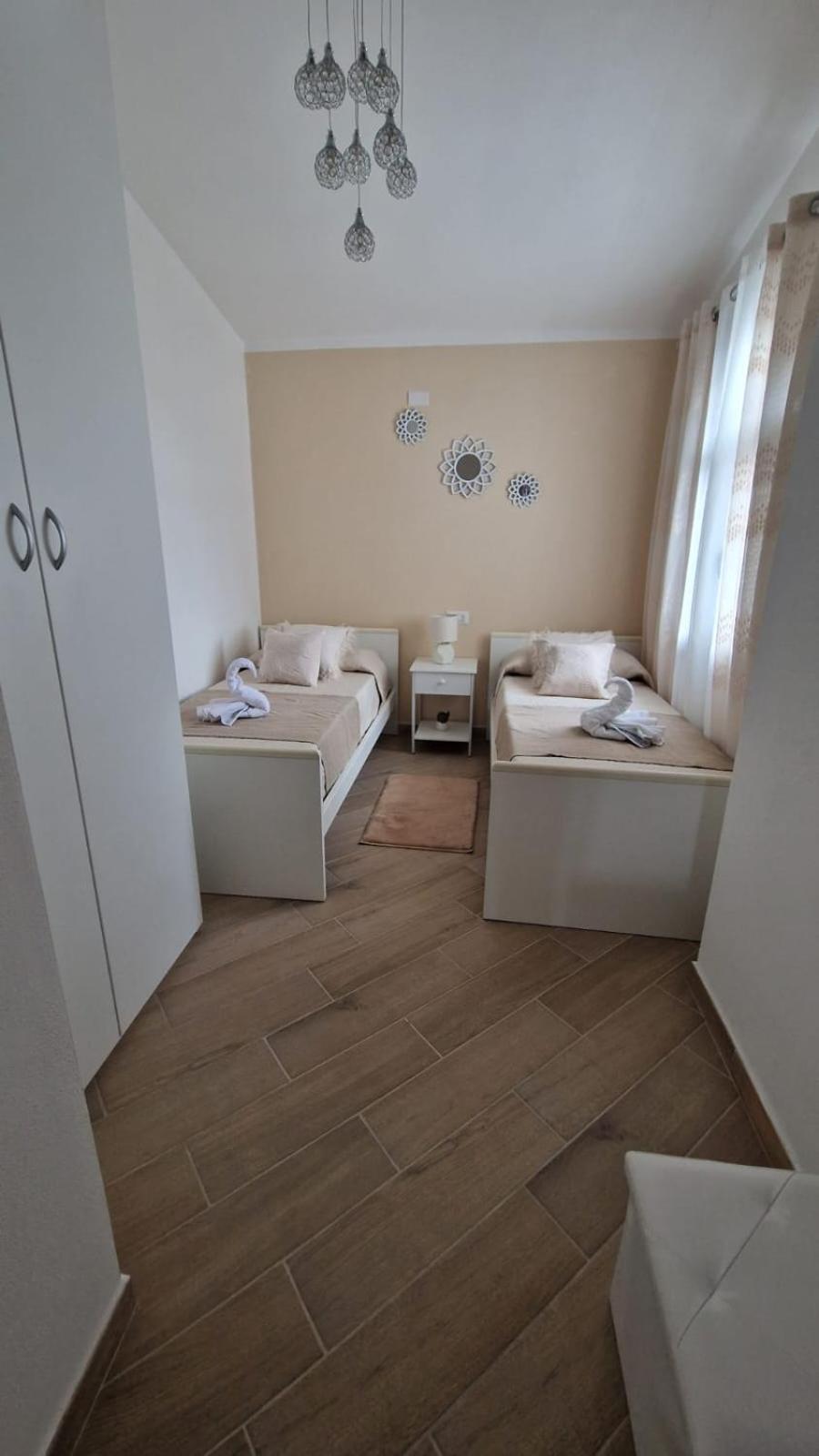 Three-Bedroom Apartment photo 1