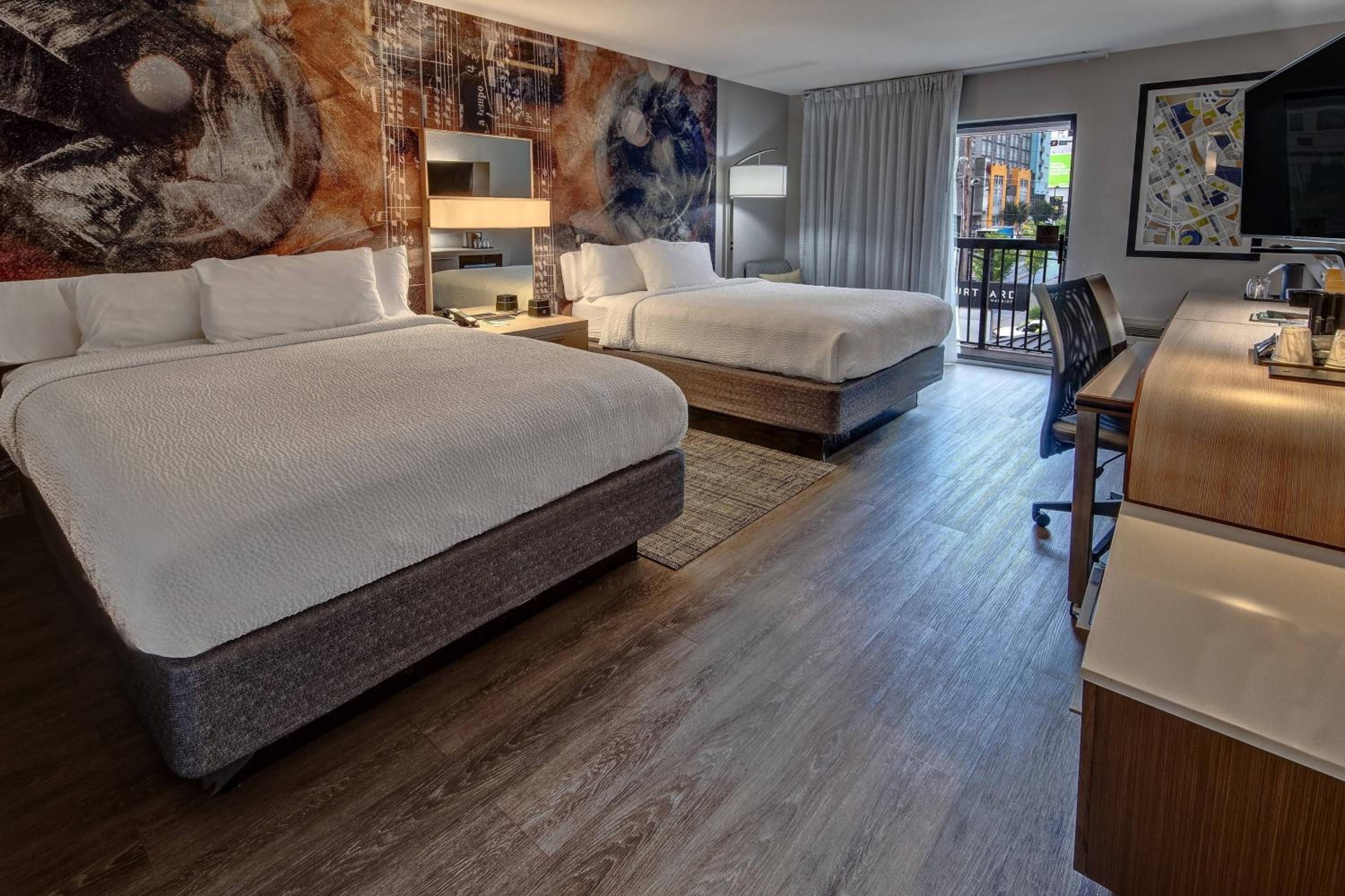 Queen Room with Two Queen Beds and Balcony - Photo 1