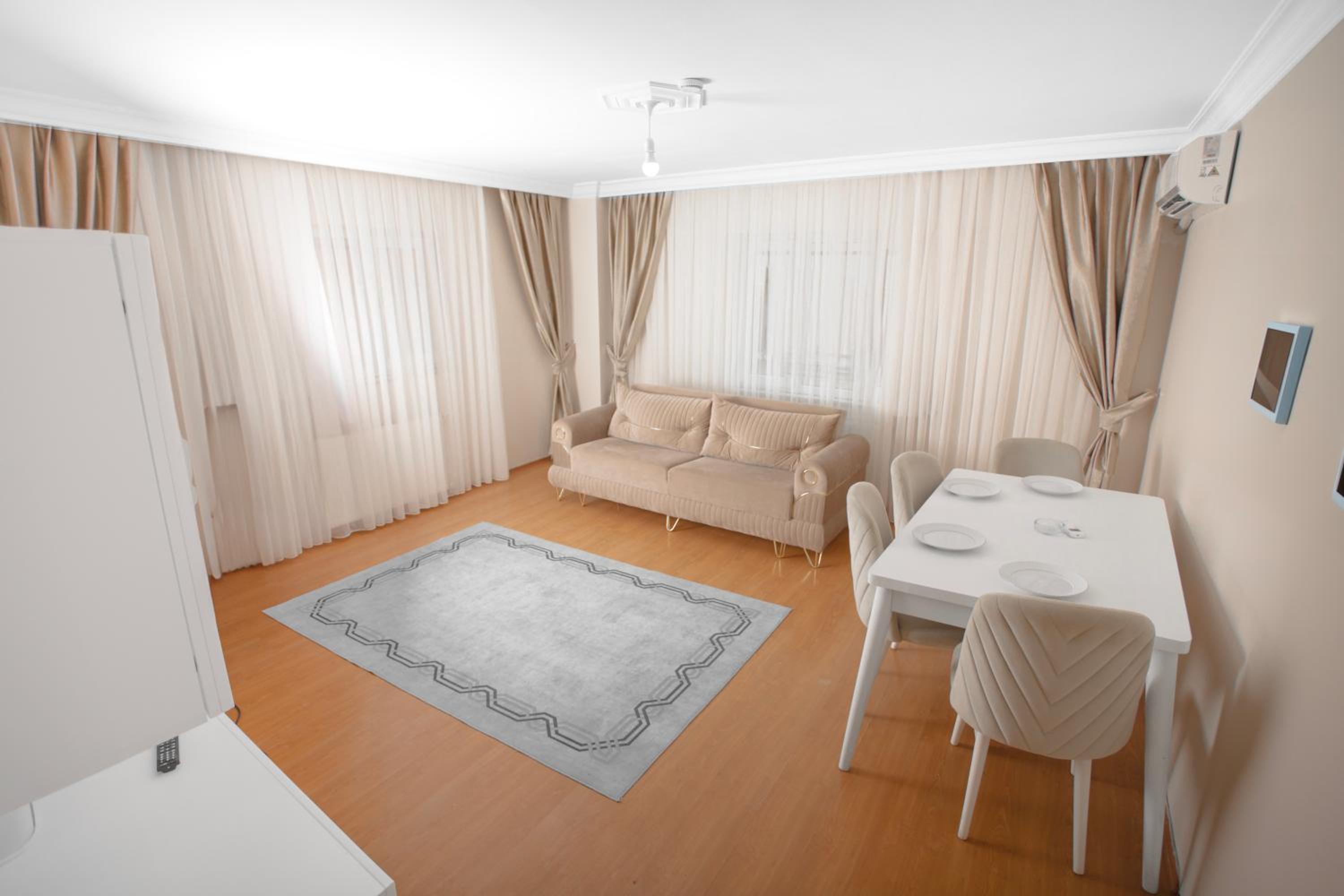 Three-Bedroom Apartment photo 1