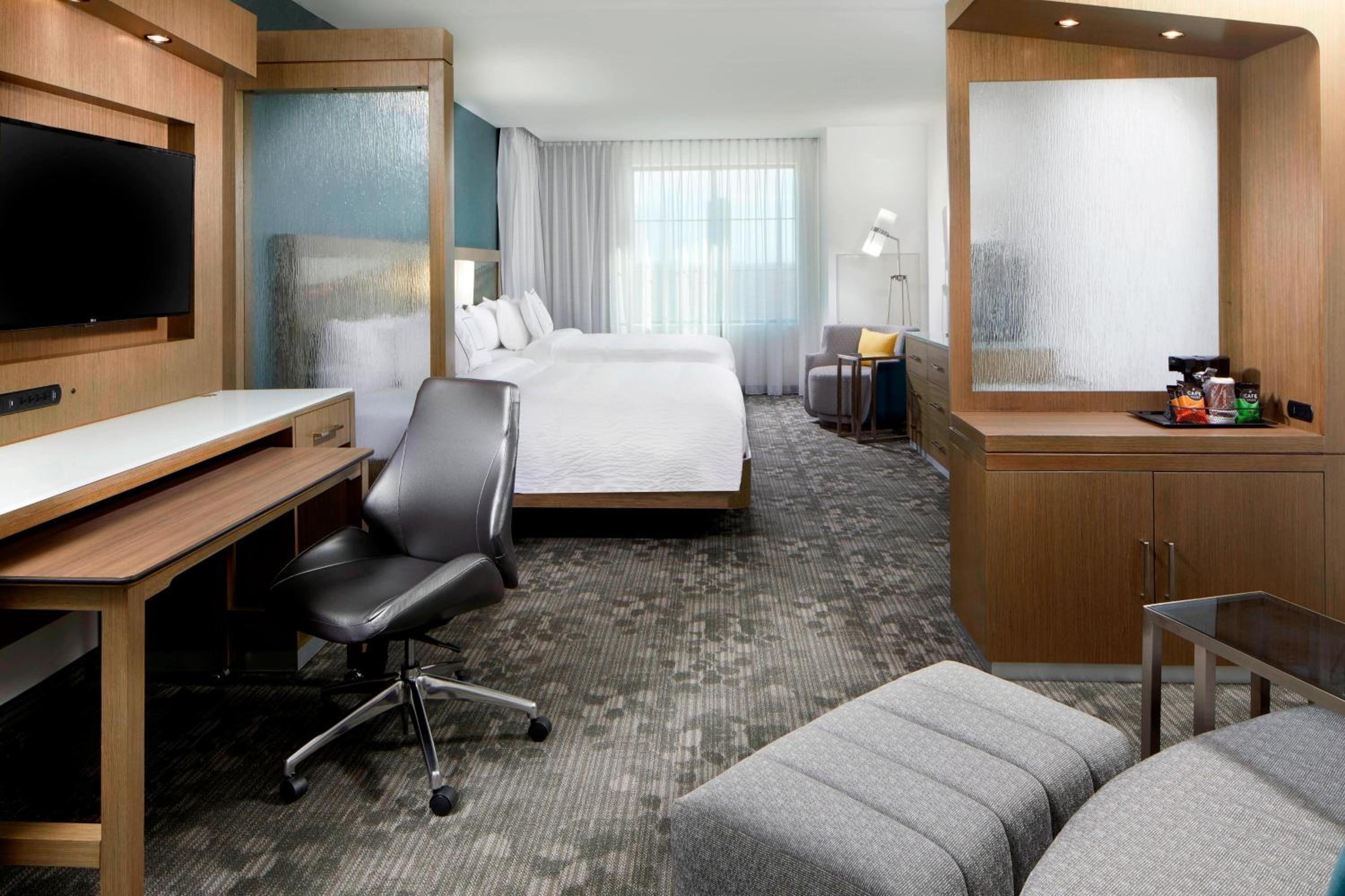 Queen Suite with Two Queen Beds and Sofa Bed