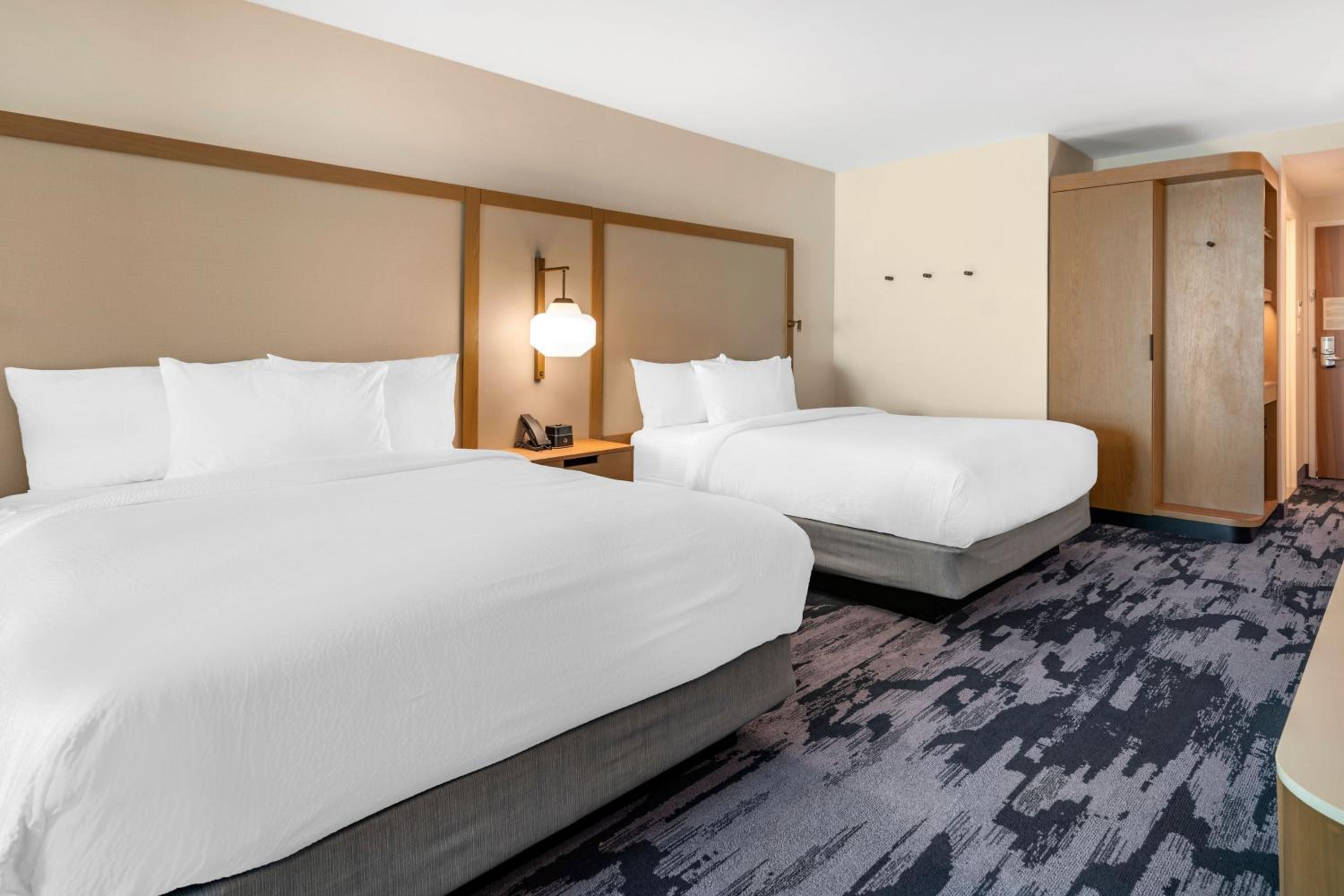 Queen Suite with Two Queen Beds and Sofa Bed - Photo 1