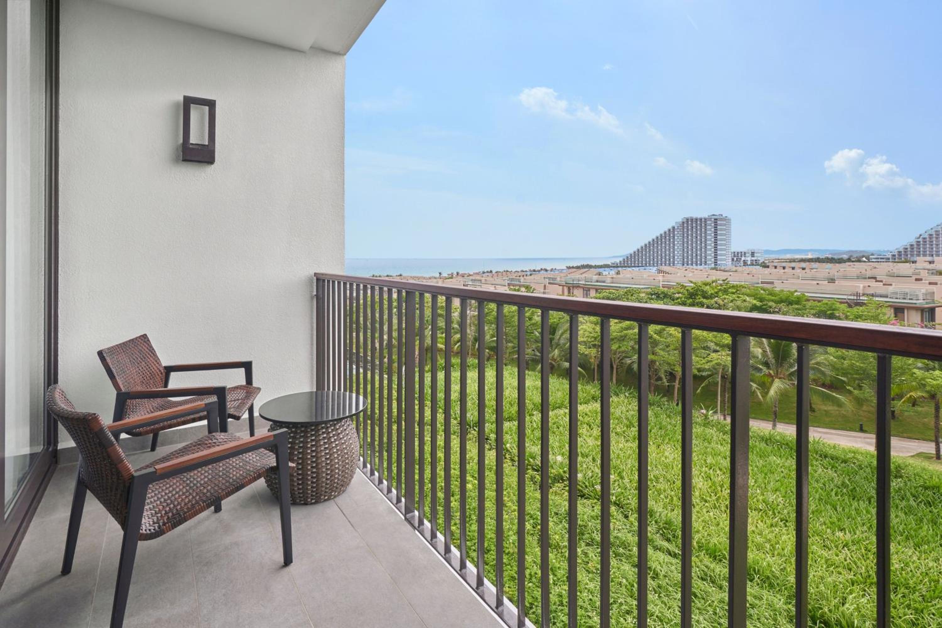 Deluxe Sea View with Two Double Beds and Balcony - Photo 9