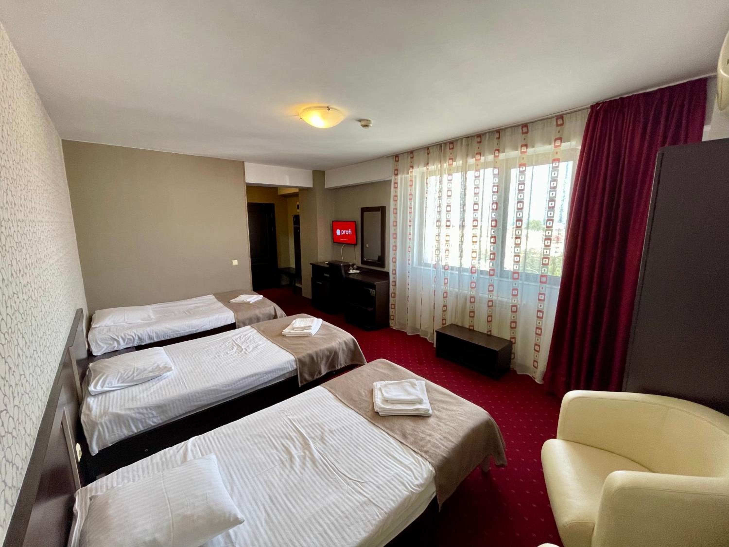 Triple Room - Photo 1